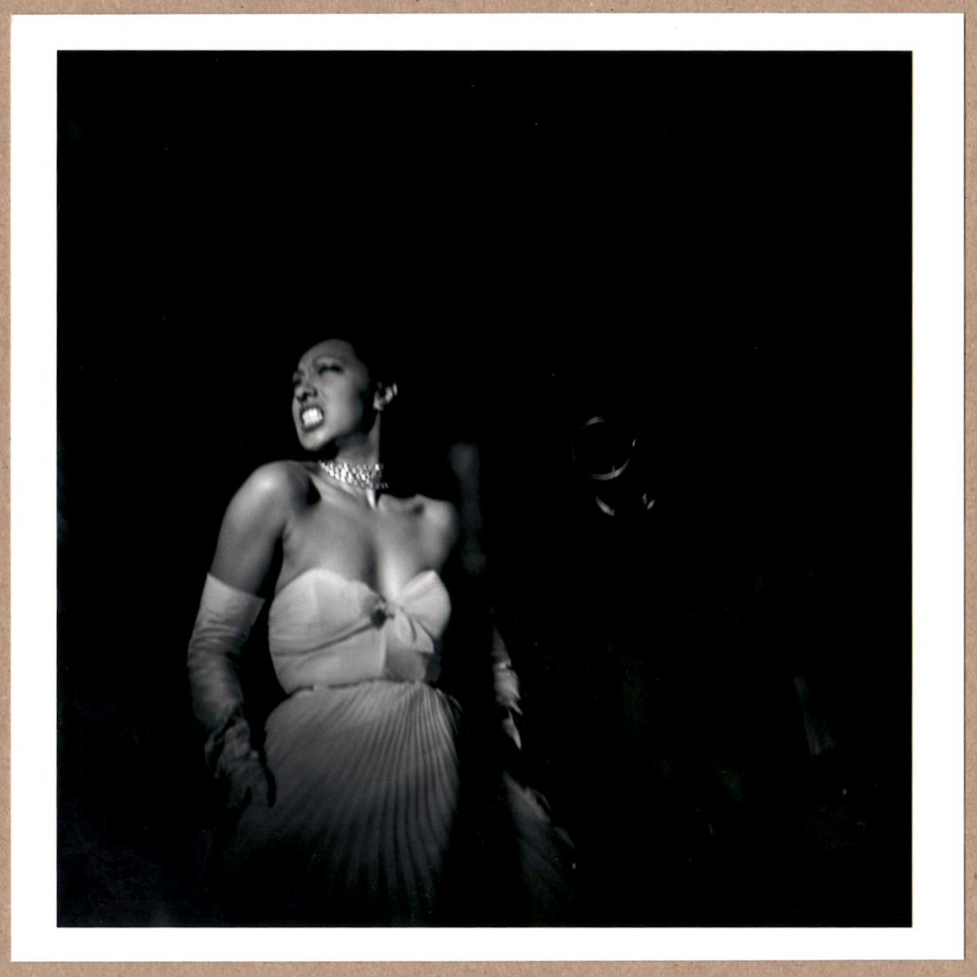 ESTATE STAMPED EVE ARNOLD JOSEPHINE BAKER HARLEM, 1950 6" x 6" MAGNUM PRINT.: Description: 6"x 6" limited edition Fuji Crystal Archival Matte paper print. Image size is 5.5" on the longest side and the paper size is 6" x 6". The Print is ESTATE STAMPED on the verso.Condition: B