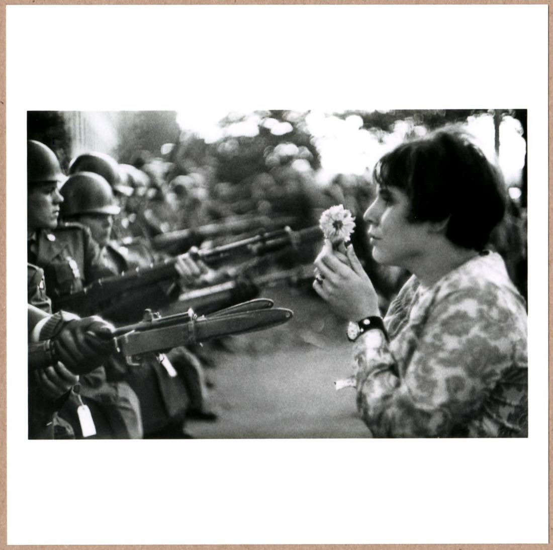 ESTATE STAMPED - MARC RIBOUD - VIETNAM PROTEST FLOWER GIRL 6" x 6" MAGNUM PRINT.: Description: 6"x 6" limited edition Fuji Crystal Archival Matte paper print. Image size is 5.5" on the longest side and the paper size is 6" x 6". The Print is ESTATE STAMPED on the verso.Condition: B