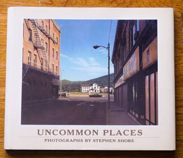 Shore, Stephen; Uncommon Places [SIGNED - 1982 1ST EDITION & 1ST PRINTING HARDCOVER WITH DUST: SIGNED COPY Aperture, NY, USA 1982. Hardcover in pictorial dust jacket. First Edition, First Printing. 4to. 63 pages with 49 colour plates. SIGNED by Stephen Shore. BOOK CONDITION: Fine; a tight, clea