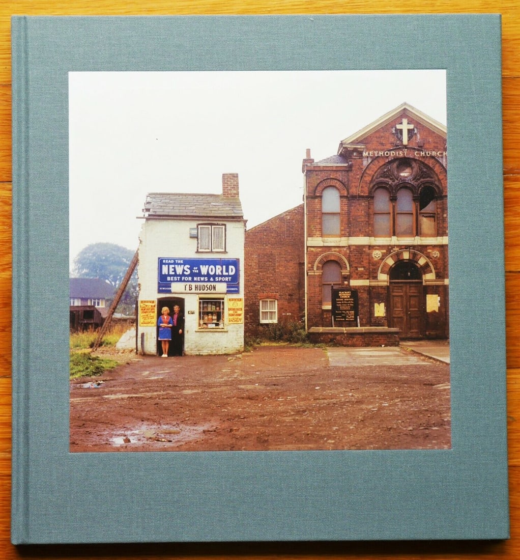 Mitchell, Peter; Strangely Familiar [SIGNED - 2013 1ST EDITION & 1ST PRINTING] (1 of 3)