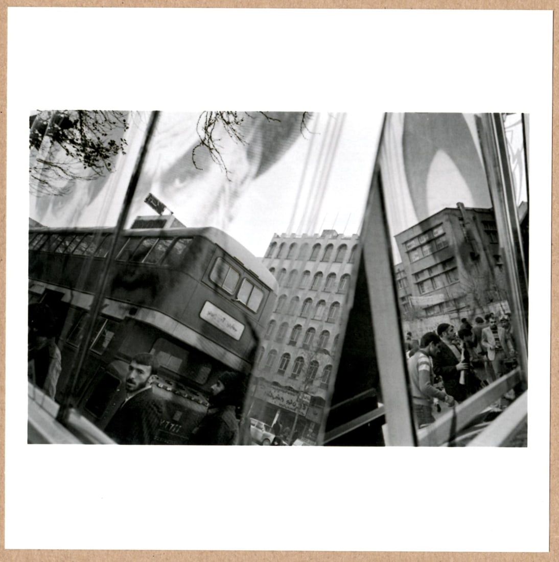 SIGNED - GILLES PERESS - MARKET STREET REFLECTION TELEX IRAN 6"x6" MAGNUM PRINT.: Description: 6"x 6" limited edition Fuji Crystal Archival Matte paper print. Image size is 5.5" on the longest side and the paper size is 6" x 6". The Print is SIGNED by Gilles Peress on the verso.Con