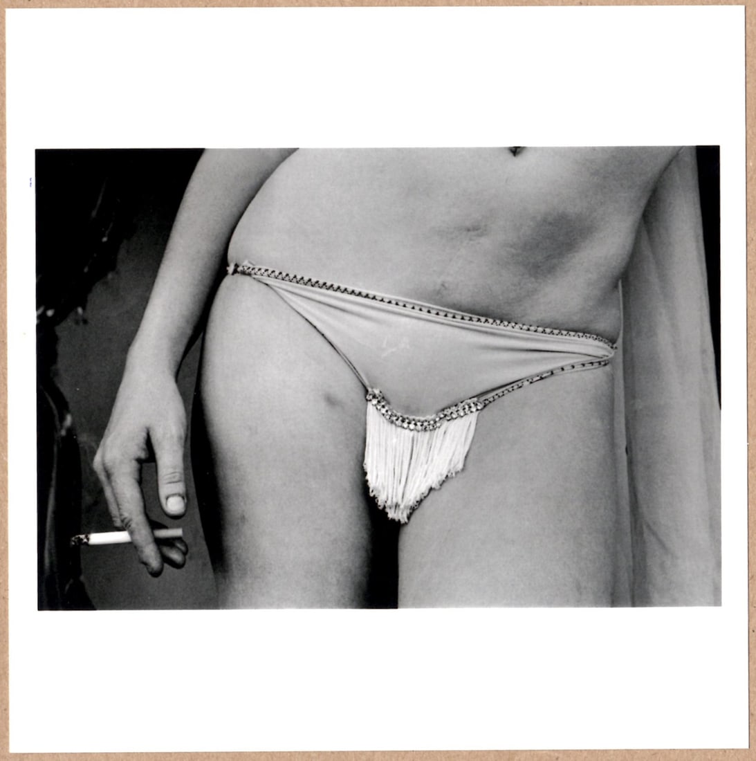 SIGNED - SUSAN MEISELAS - FROM THE SERIES CARNIVAL STRIPPERS - RARE 2014 LTD 6"x 6" MAGNUM ARCHIVAL: Description: 6"x 6" limited edition Fuji Crystal Archival Matte paper print. Image size is 5.5" on the longest side and the paper size is 6" x 6". The Print is SIGNED by Susan Meiselas on the verso.Co