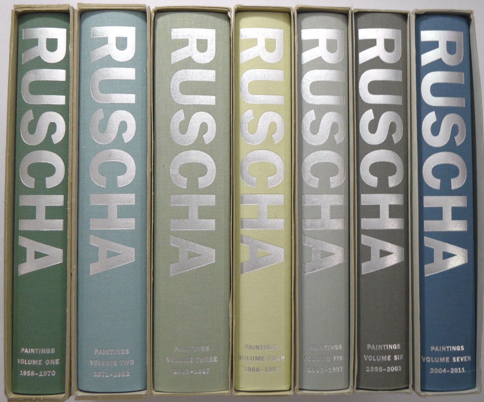 Ed Ruscha: Catalogue Raisonne of the Paintings [COMPLETE 7 VOLUME SET - VOLUMES 1, 2, 3, 4, 5, 6, 7;: New York / Gottingen, Germany: Gagosian Gallery / Steidl. Seven Volume Set / Seven Hardcovers in Cardboard Slipcases. First Edition, First Printing. Exhaustive catalogue with introductory essays, a bi