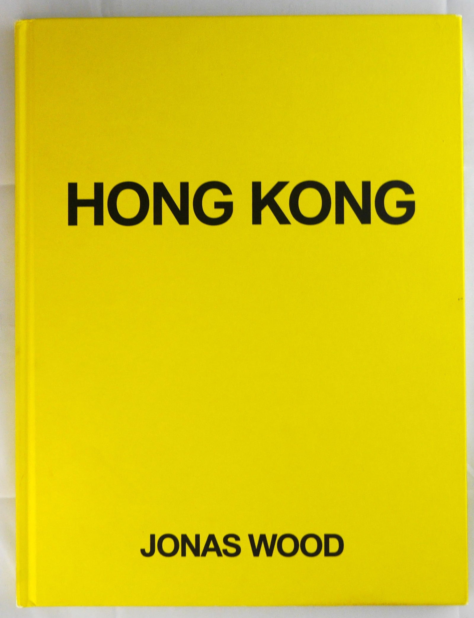 Wood, Jonas; Hong Kong [SIGNED COPY WITH BASKETBALL DRAWING]: Gagosian, 2021. Hardcover in yellow paper boards. First Edition, First Printing. Unpaginated with circa 70 pages filled with color illustrations featuring flower images by Jonas Wood throughout. Text