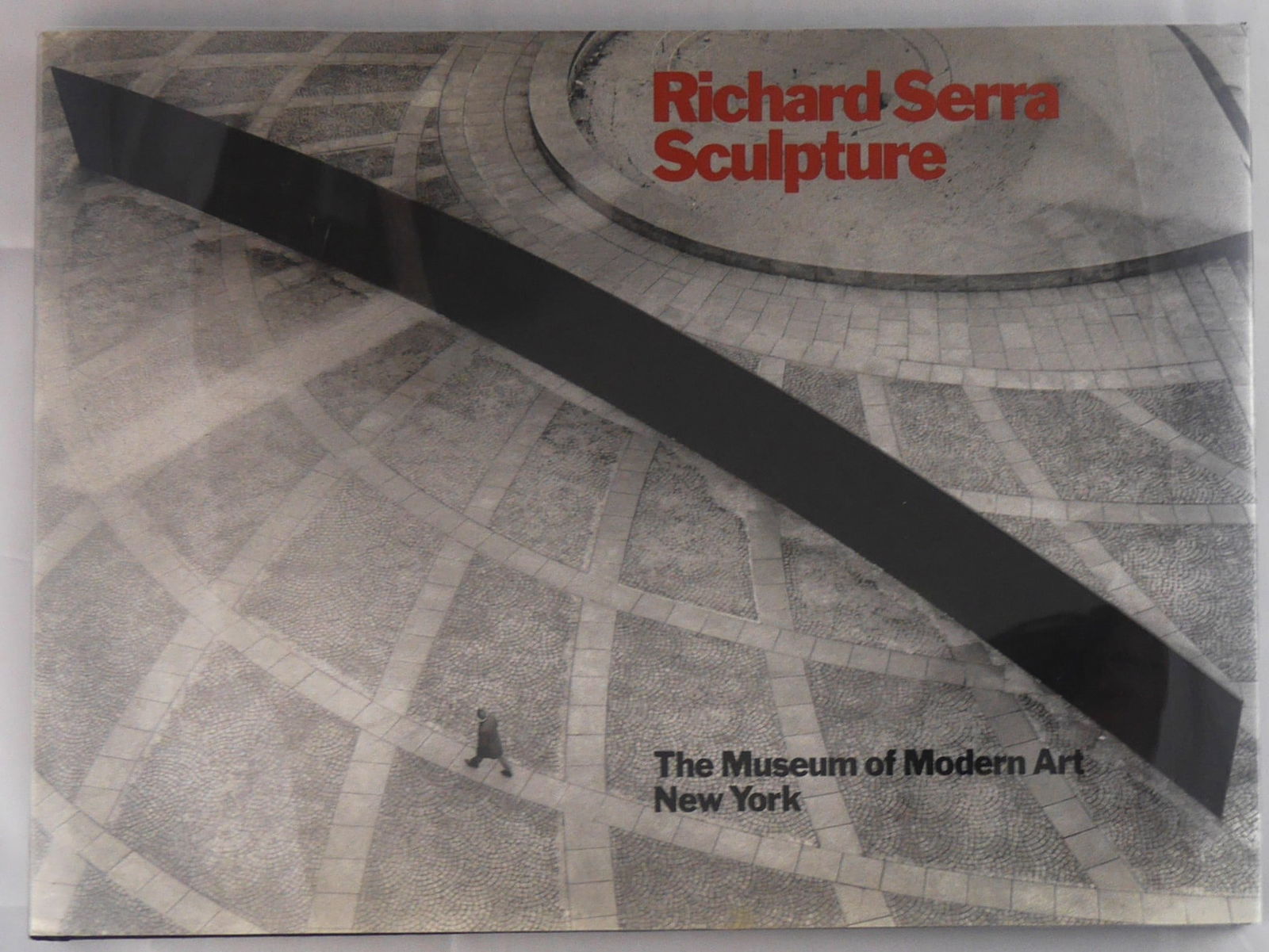 Serra, Richard [SIGNED]; Krauss, Rosalind K.; Richard Serra Sculpture [1986 MOMA MONOGRAPH - FINE]: New York, Museum of Modern Art, 1986. Hardcover in pictorial dust jacket. First Edition, First Printing. Oblong 4to. 184 pages with 185 black and white photographic images and illustrations throughout