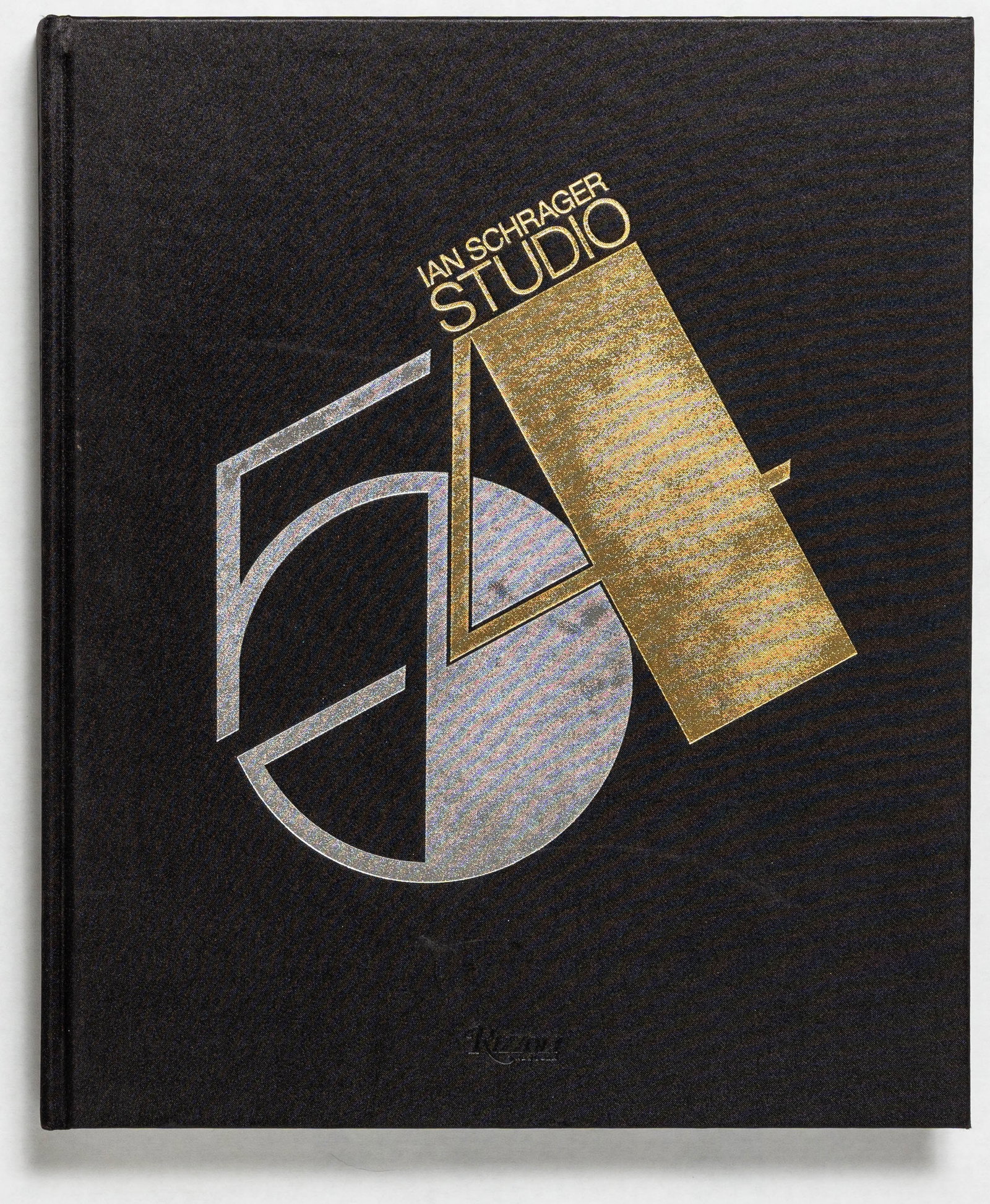 Schrager, Ian, Studio 54 [SIGNED 1ST EDITION - FINE]: SIGNED COPY - Rizzoli, 2017. Hardcover with printed boards. First Edition, First Printing. 14 x 11 inches. 324 pages filled with black and white and color photographic images throuighout. A large and 