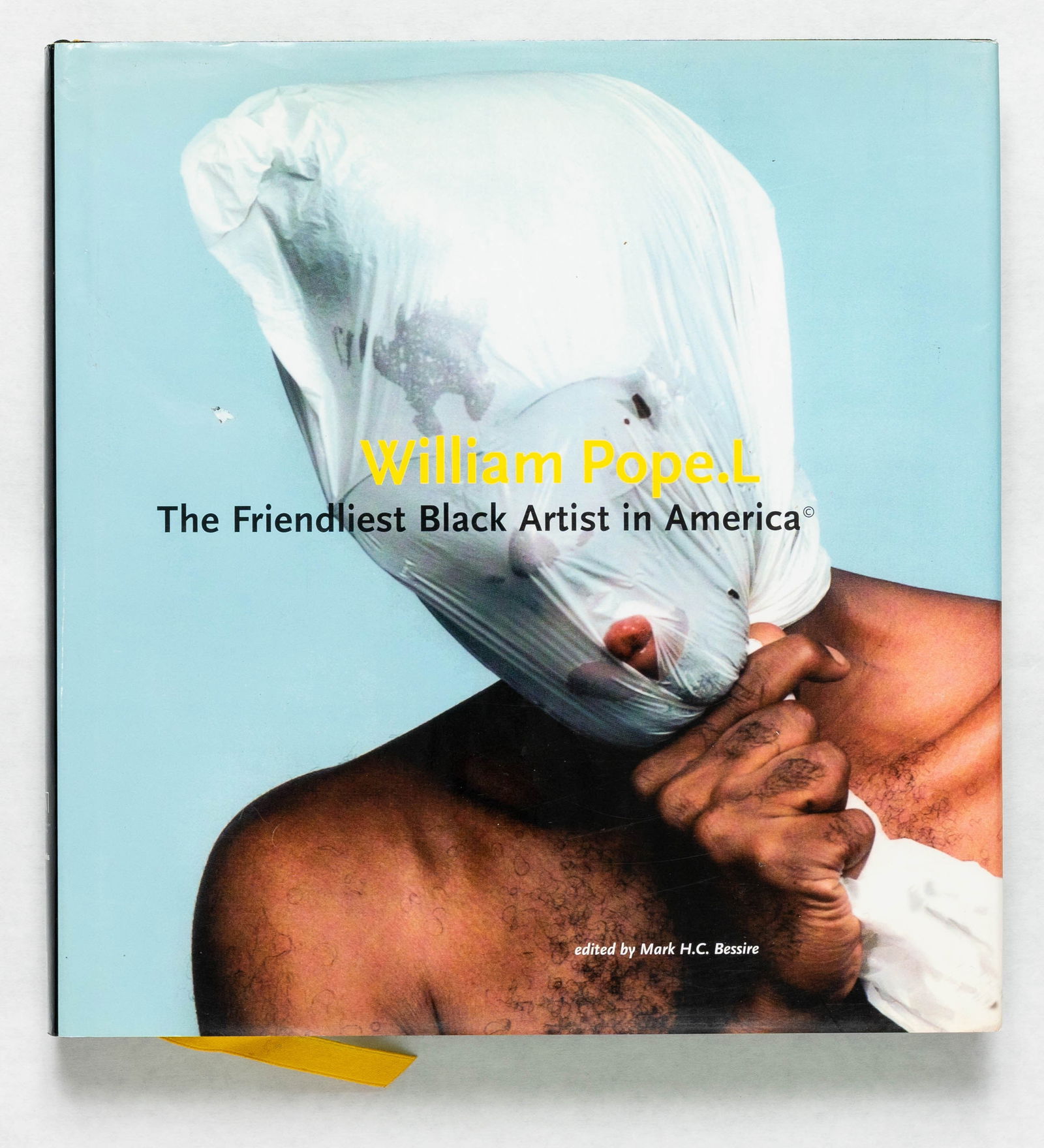 Pope.L, William, William Pope.L The Friendliest Black Artist in America [SIGNED with 2 ORIGINAL: Mit, Press, 2002. Hardcover in pictorial dust jacket. First Edtition, First Printing. 237 pages filled with photos and illustrations throughout. Essays in English by Mark H. C. Bessire, Suzanne Presto