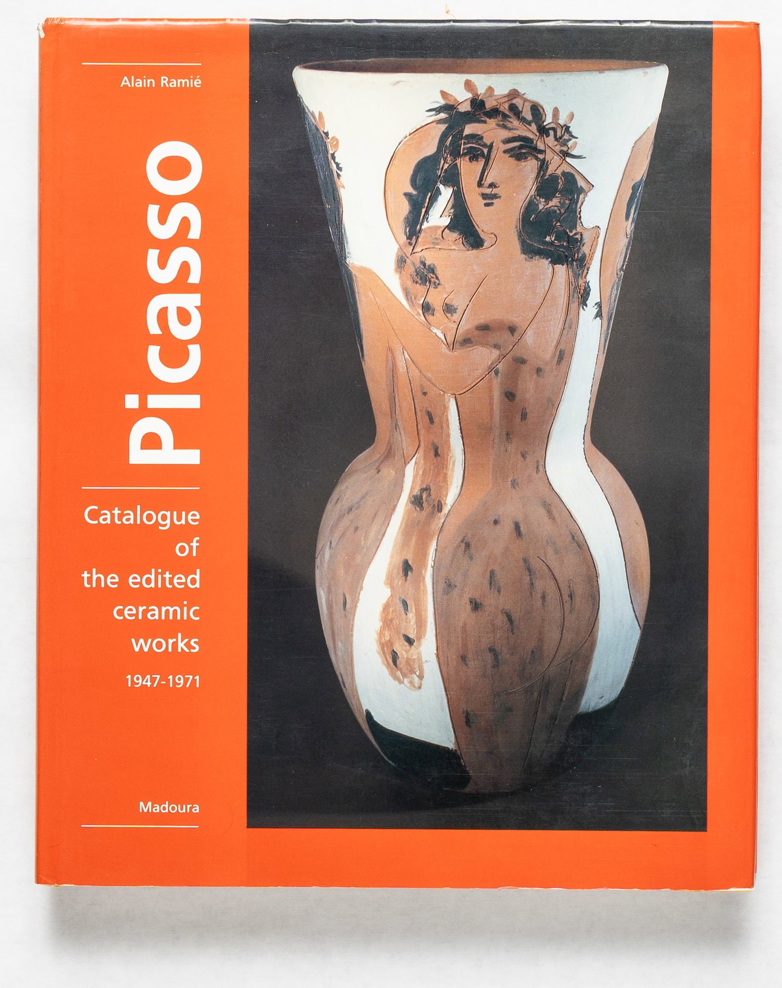 Raime, Alain; Picasso, Pablo; Catalogue of the Edited Ceramic Works [1988 1ST EDITION HARDCOVER]: Madoura, 1988. HArdcover in tan cloth boards with white lettering with red pictorial dust jacket. 12 x 10 inches, 320 pages with 570 color plates and 75 b&w illustrations.Includes Bibliography, Exhibi