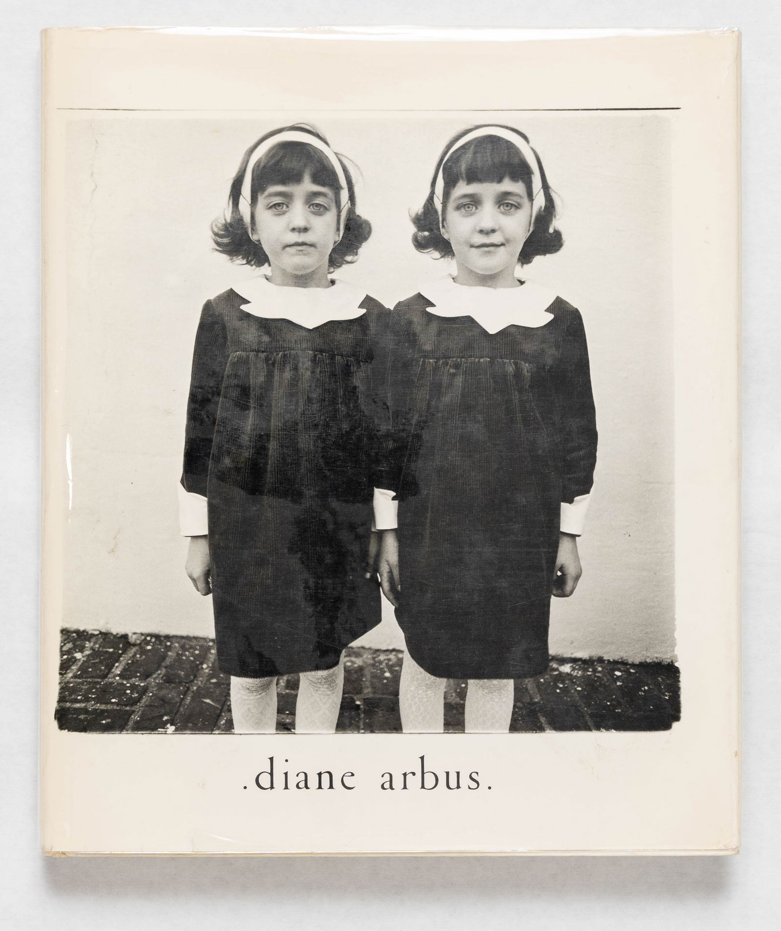 Arbus, Diane;  An Aperture Monograph  [1972 1ST ED & 1ST PRINT [WITH 2 GIRLS IN RAINCOATS IMAGE] (1 of 10)