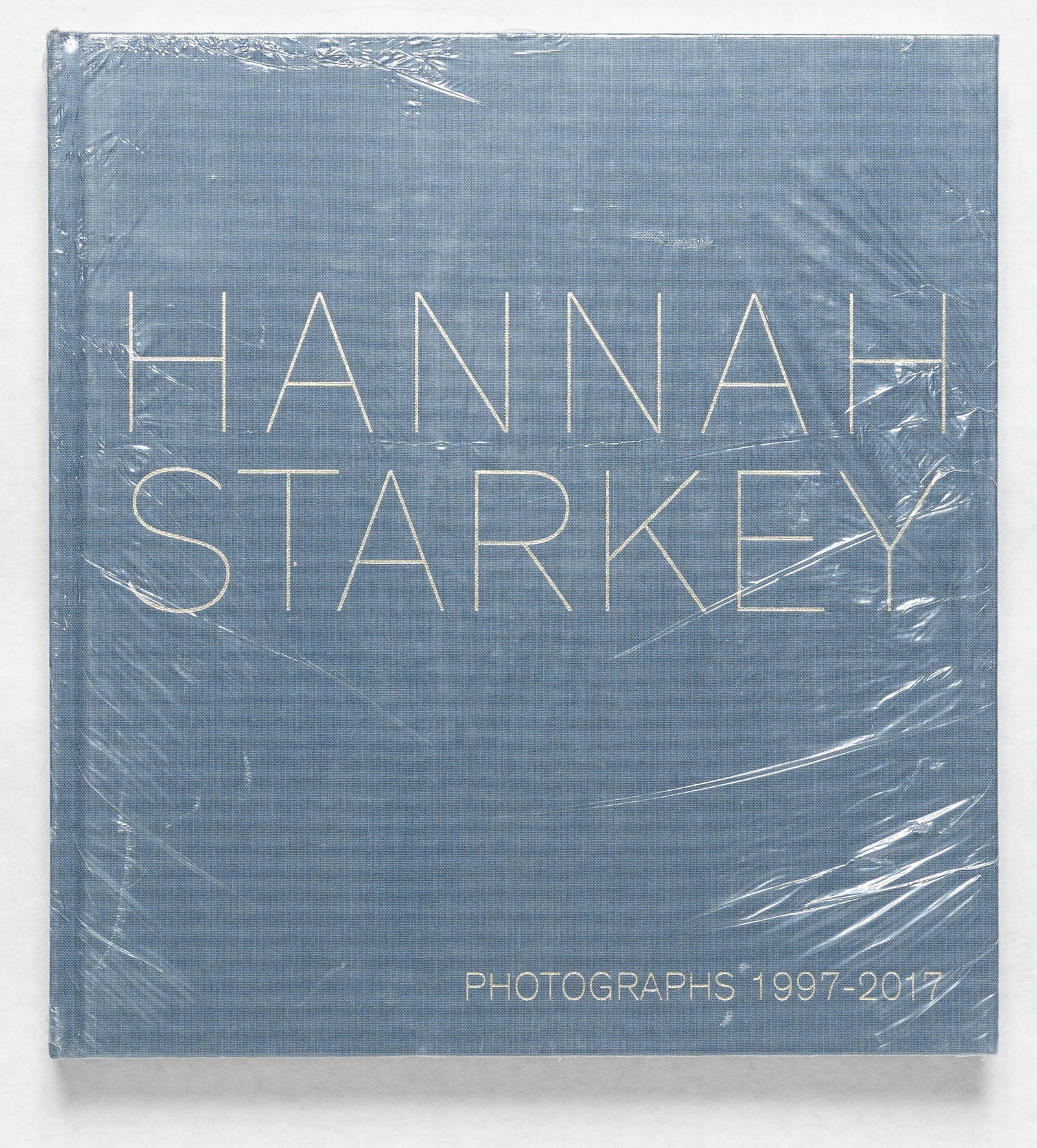 Starkey, Hannah; Hannah Starkey: 1997-2017 [2018 1ST EDITION & 1ST PRINTING - NEW]: MACK, 2018. Hardcover in blue cloth covers. First Edition, First Printing. 184 pages with numerous photographic images throughout. BOOK CONDITION: Fine; a solid, tight, clean copy still sealed in the