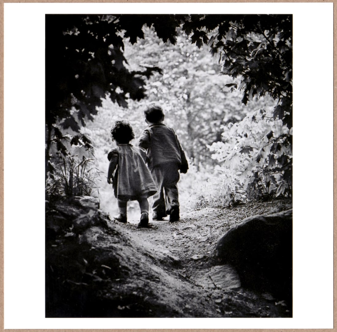 W. Eugene Smith; ESTATE STAMPED - WALK TO PARADISE GARDEN 1946 6" x 6" PHOTOGRAPH: Description: 6"x 6" limited edition Fuji Crystal Archival Matte paper print. Image size is 5.5" on the longest side and the paper size is 6" x 6". The Print is ESTATE STAMPED on the verso.Condition: B