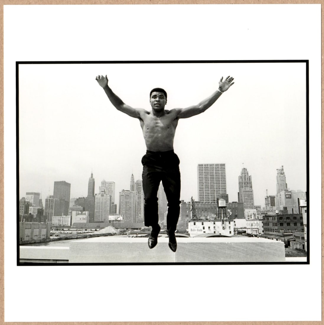 Thomas Hoepker ; SIGNED - MUHAMMAD ALI JUMPING ON A BRIDGE OVER THE CHICAGO RIVER, 1966 - PHOTOGRAPH (1 of 2)