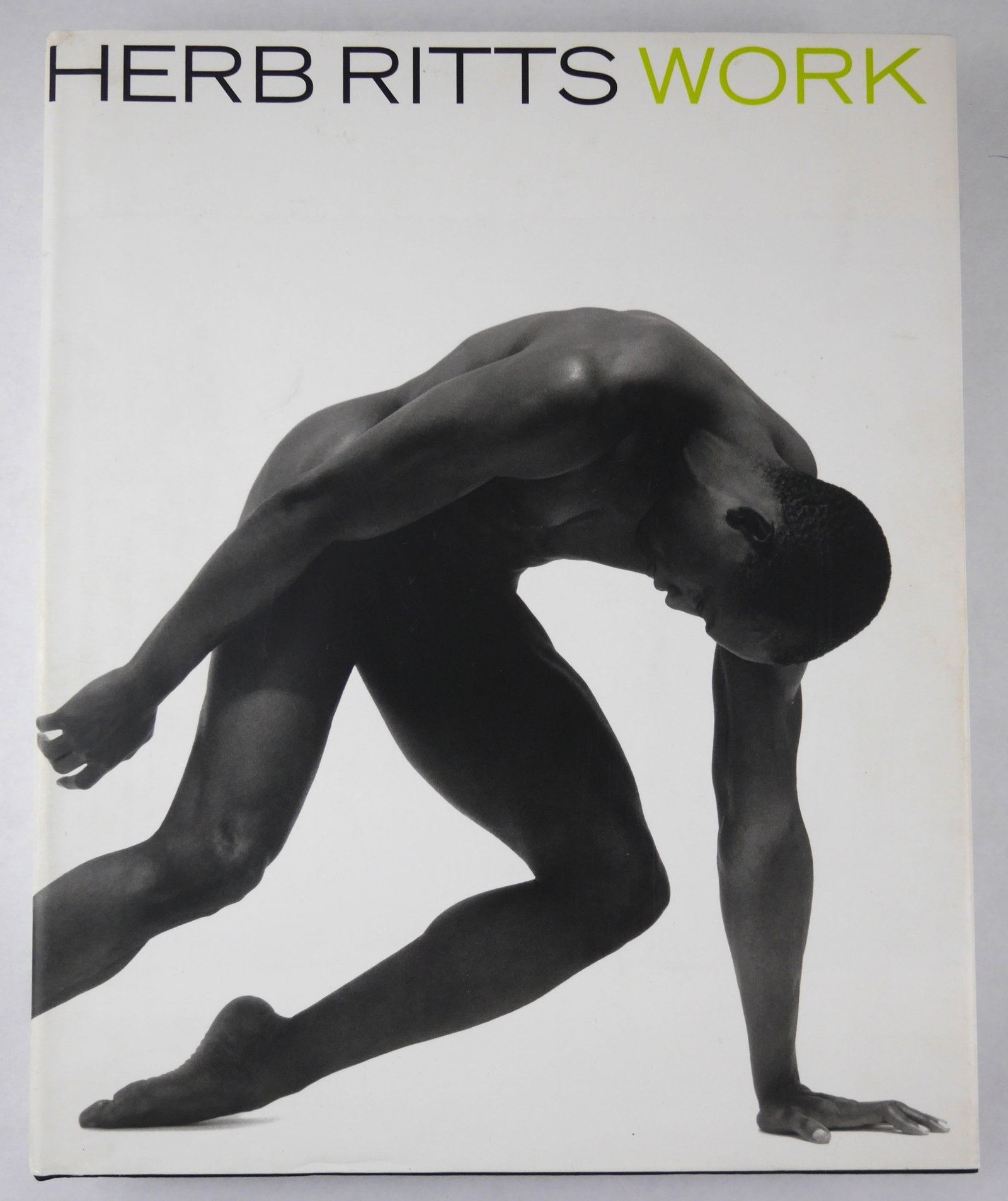 Ritts, Herb; Work [SIGNED 1996 1ST EDITION 1ST PRINTING HARDCOVER - FINE]: Bulfinch, 1996. Hardcover in pictorial dust jacket. First Edition, First Printing. 12 x 14 inches 240 photographic images offering an exhilerating ovrview of Ritts's ourve, including portraits of Holl
