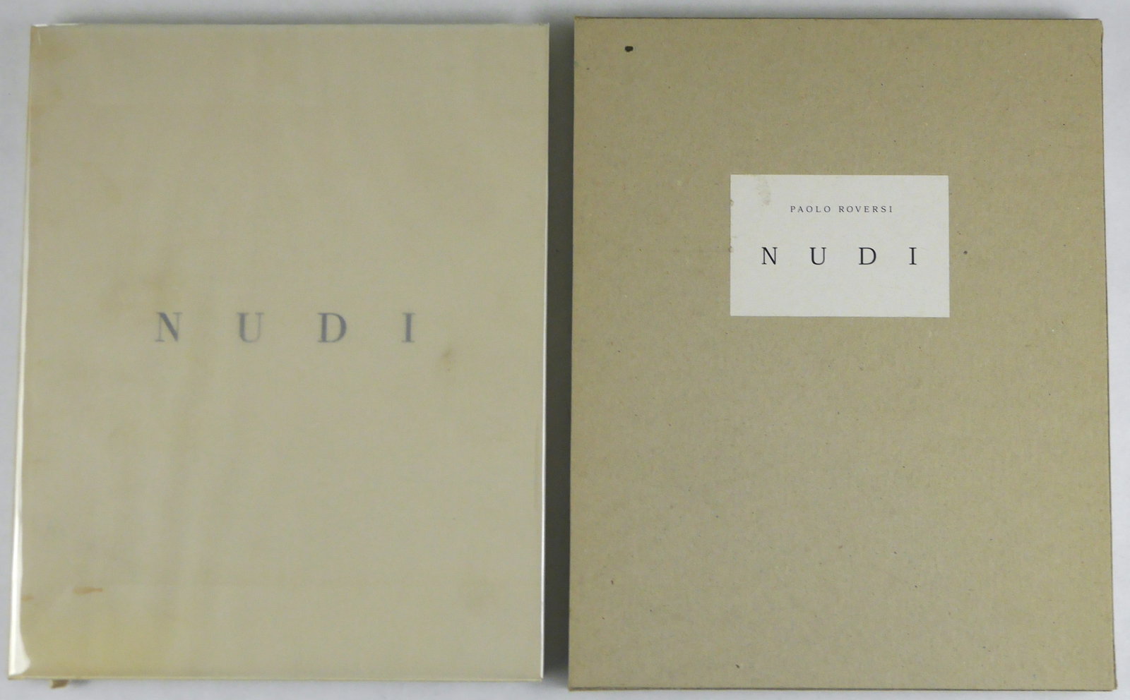 Roversi, Paolo; Nudi [1999 1ST EDITION & 1ST PRINTING - FINE COPY]: Stromboli, Paris, 1999. Cloth. First Edition in vellum dust jacket in thin cardboard slipcase (as issued). 4to - over 9¾" - 12" tall. 102 pages with 46 photographs. SIGNED by Roversi on the title