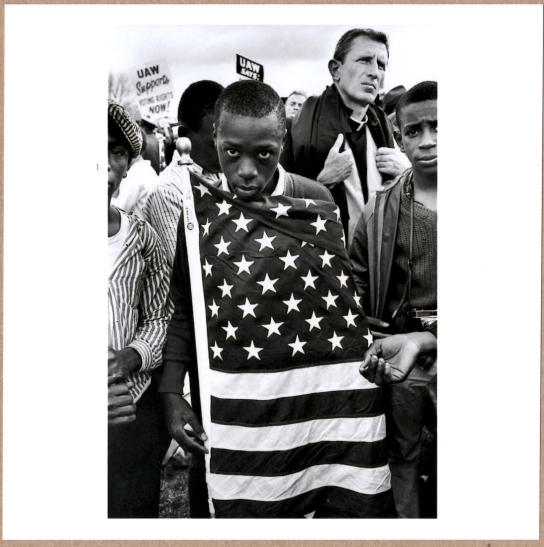 SIGNED BRUCE DAVIDSON AMERICAN FLAG, CIVIL RIGHTS MARCH SELMA TO MONTGOMERY ALABAMA, 1965 PHOTOGRAPH: Description: 6"x 6" limited edition Fuji Crystal Archival Matte paper print. Image size is 5.5" on the longest side and the paper size is 6" x 6". The Print is SIGNED by Bruce Davidson on the verso.Co