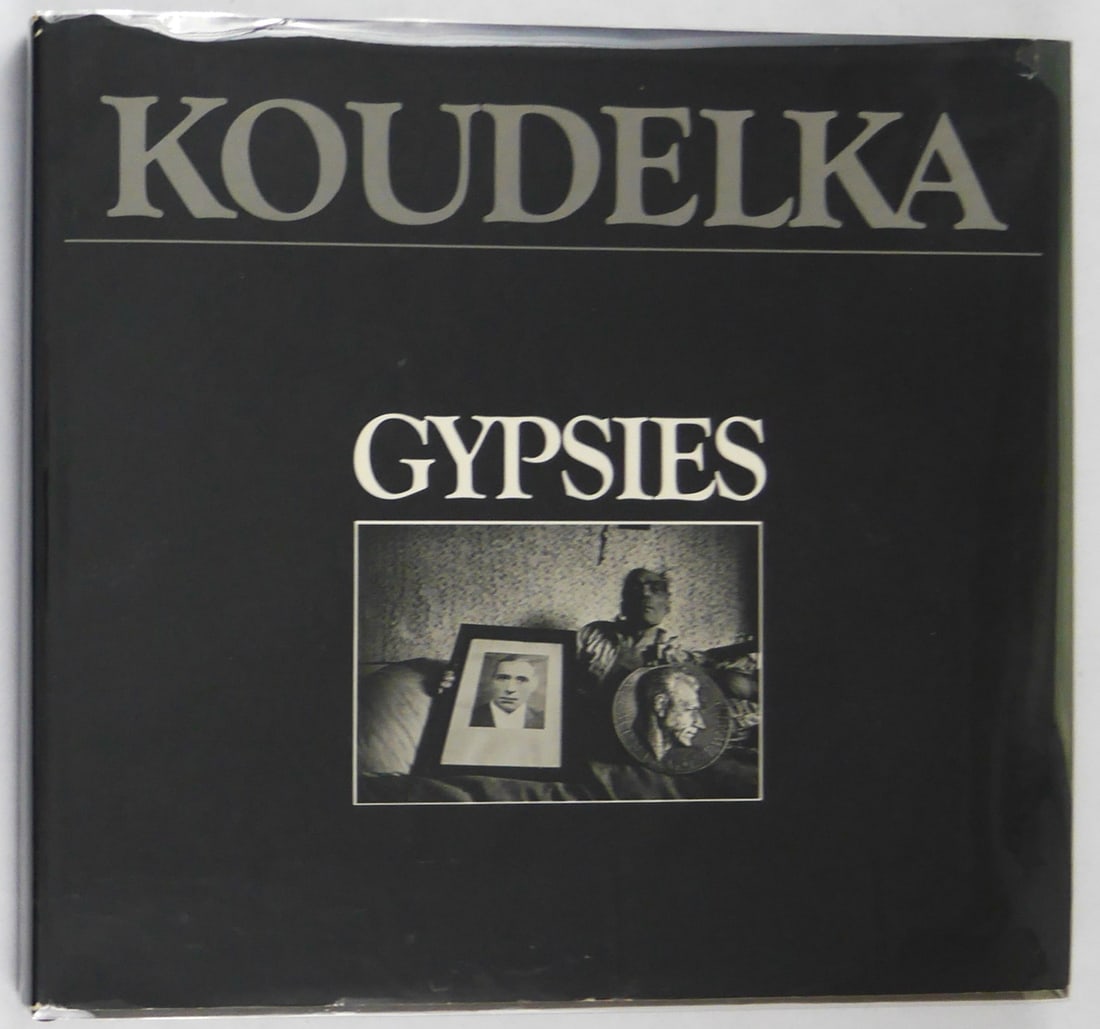 Koudelka, Josef; Gypsies [1975 1ST EDITION & 1ST PRINTING - NICE COPY]: APERTURE 1975. Hardcover in pictorial dust jacket. First Edition, First Printing (stated). 4to - over 9¾" - 12" tall. Book Condition: Fine tight, clean copy in a Near Fine dust jacket showing sli