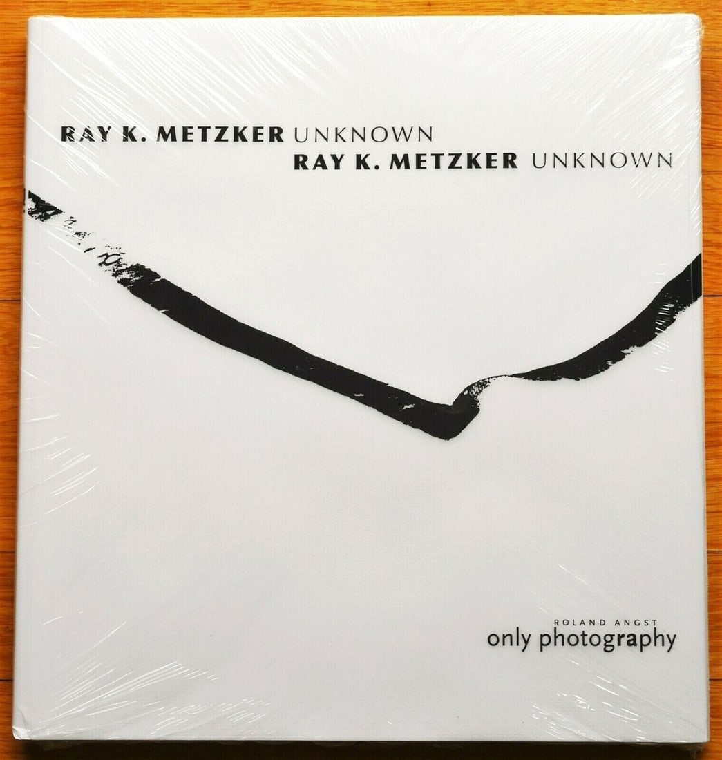 Metzker, Ray; Unknown [2018 LIMITED EDITION #/333 - 1ST EDITION & 1ST PRINTING]: Only Photography, 2018. Hardcover in pictorial opaque dust jacket. First Edition, First Printing. Limited Edition of only 333 individually numbered copies.124 pagws with 94 photographic images in blac