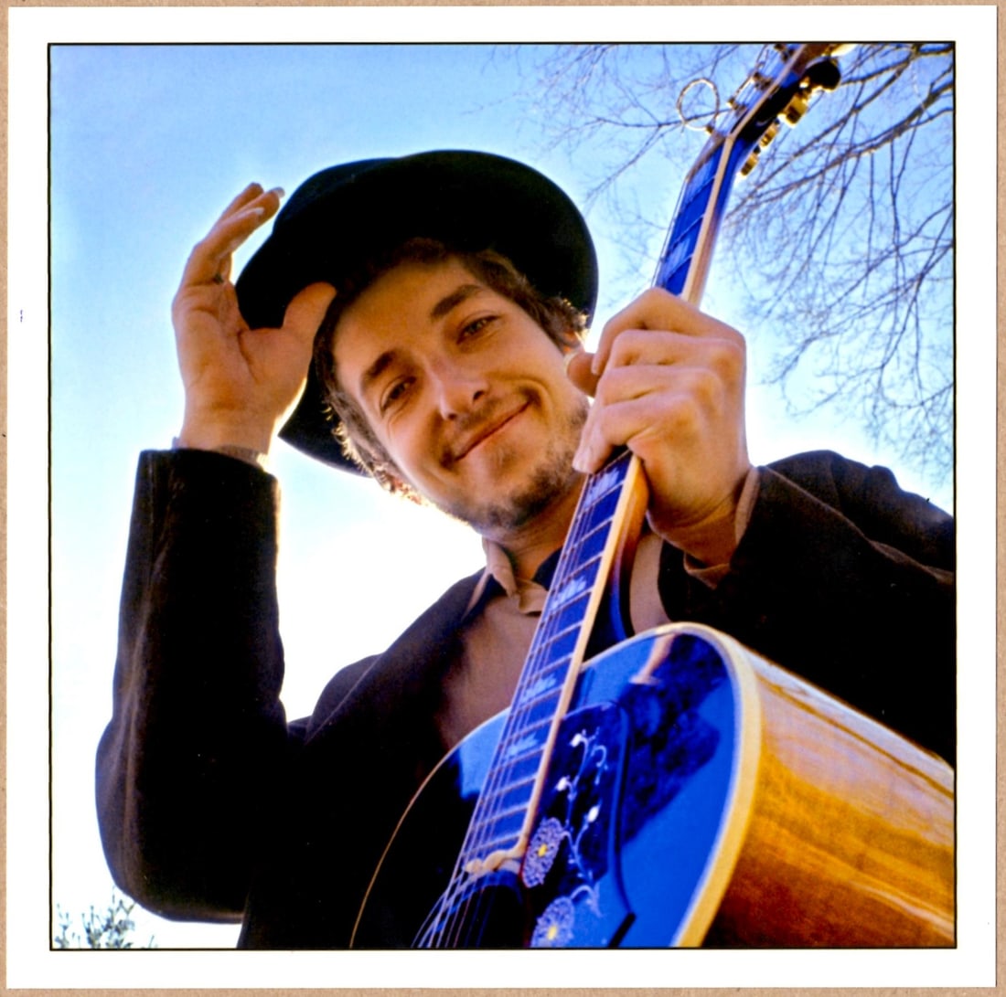 SIGNED - ELLIOTT LANDY - BOB DYLAN, WOODSTOCK, NEW YORK 1969 LTD 6" x 6" PHOTOGRAPH: Description: 6"x 6" limited edition Fuji Crystal Archival Matte paper print. Image size is 5.5" on the longest side and the paper size is 6" x 6". The Print is SIGNED by Elliott Landy on the verso.Con