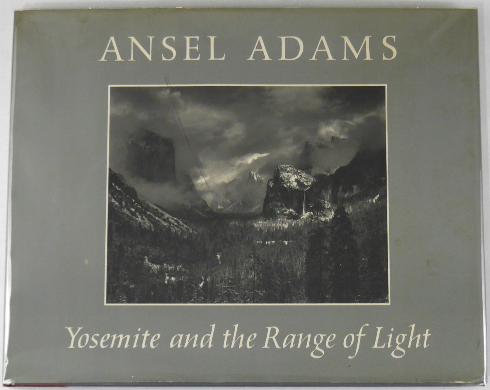 Adams, Ansel; Yosemite and the Range of Light [SIGNED - 1ST EDITION, 3RD PRINTING]: SIGNED COPY Yosemite and the Range of Light, 1980. Hardcover in pictorial dust jacket. First Edition, Third Printing (stated). Introduction by Paul Brooks. More than one hundred magnificent photograph