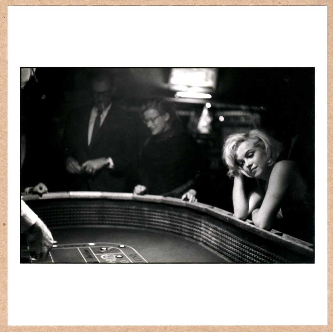 ESTATE STAMPED - EVE ARNOLD - MARILYN MONROE, NEVADA, 1960 - 6" x 6" MAGNUM PRINT: Description: 6"x 6" limited edition Fuji Crystal Archival Matte paper print. Image size is 5.5" on the longest side and the paper size is 6" x 6". The Print is ESTATE STAMPED on the verso.Condition: B