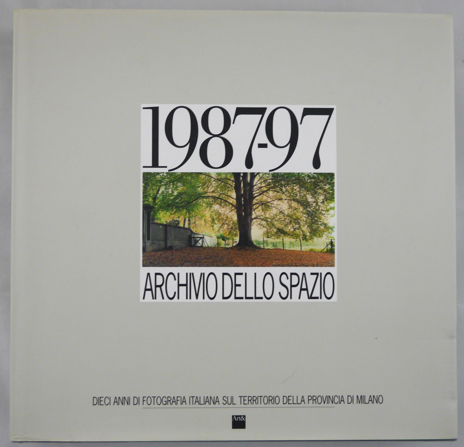 Ghirri, Luigi; Guido Guidi; et al. Archivio dello spazio 1987-97: Dieci anni della fotografia: Arti Grafiche Friulane, 1998. Hardcover in pictorial dust jacket. First Edition, First Printing. 546 pages with over 500 photographic images throughout in black and white and color. A kaleidescopic an