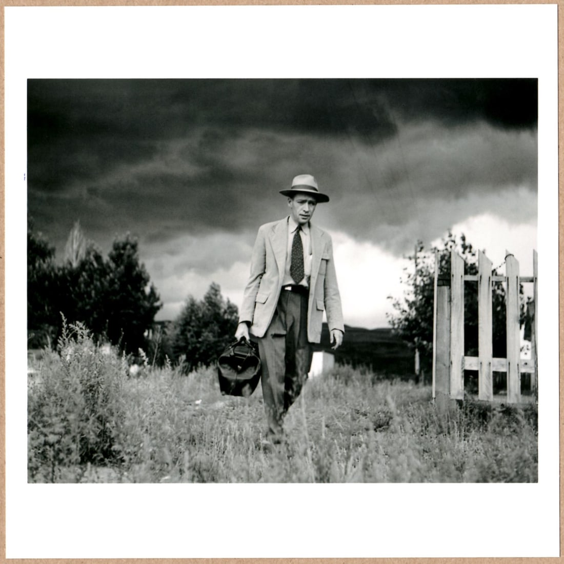 ESTATE STAMPED - W. EUGENE SMITH - COUNTY DOCTOR, 1946 6" x 6" MAGNUM PRINT: Description: 6"x 6" limited edition Fuji Crystal Archival Matte paper print. Image size is 5.5" on the longest side and the paper size is 6" x 6". The Print is ESTATE STAMPED on the verso.Condition: B