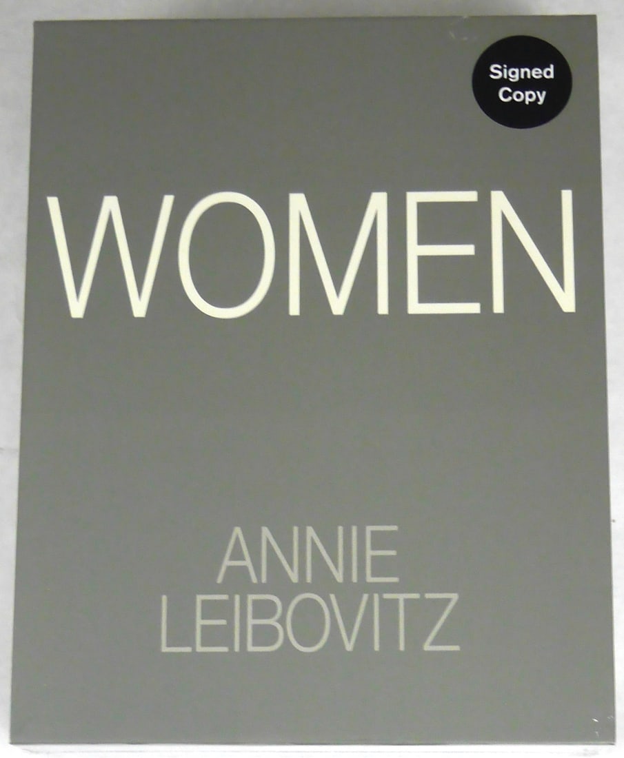 Leibovitz, Annie; Sontag, Susan; Women [SIGNED 2025 1ST EDITION 2 VOLUME SLIPCASED EDITION]: SIGNED COPY Phaidon, 2025. 2 hardcover volumes in printed cardboard slipcase. First Edition, First Printing. 493 pages with hundreds of portraits, including several complimenary essays. Volume 1 repub