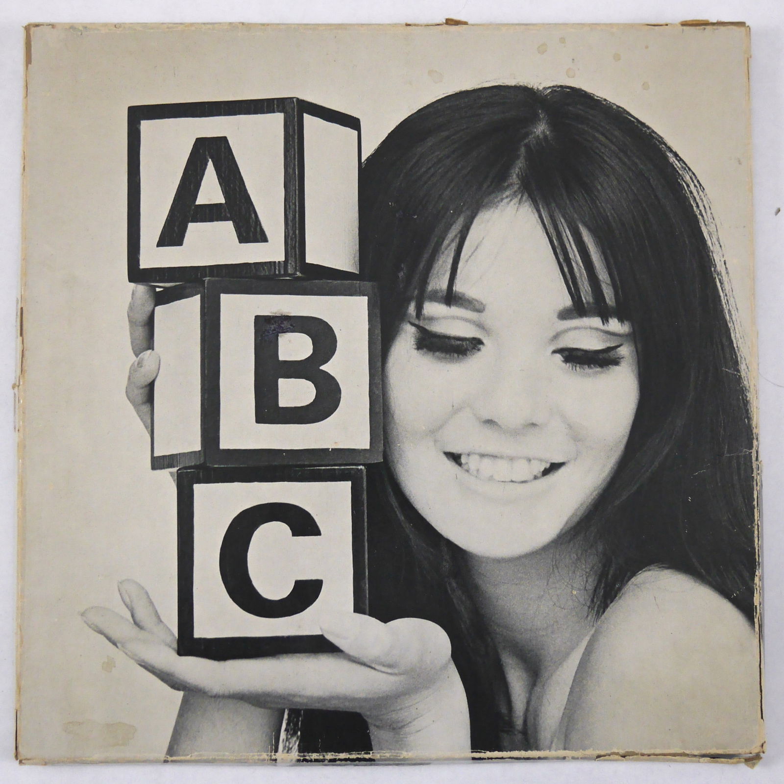 Bez, Frank; LeVanda, Stephanie; ABC, The Alphabet of Beauty [1967 COMPLETE PORTFOLIO OF 30 PLATES IN: Kansas City: The Leslie Company, 1967. first Edition, First Printing. 11.5 x 11.5 inches. Unbound. Photographs by Frank Bez. Concept by Stephanie LeVanda. 30 leaves stored in photographically illustra