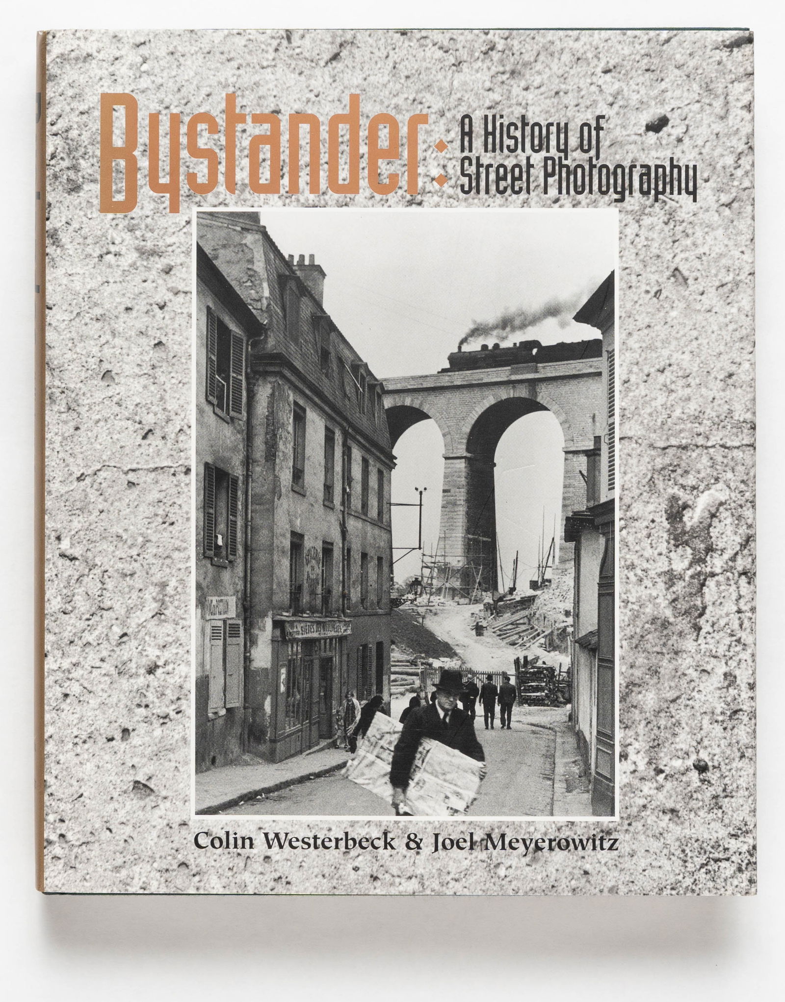 Meyerowitz, Joel; Bystander: A History of Street Photography [SIGNED BY MEYEROWITZ - 1994 1ST ED: SIGNED COPY - Bulfinch Press / Little, Brown and Company, 1994. Hardcover in pictorial dust jacket. First Edition, First Printing. 430 pages offering a comprehensive look at street photography with 28