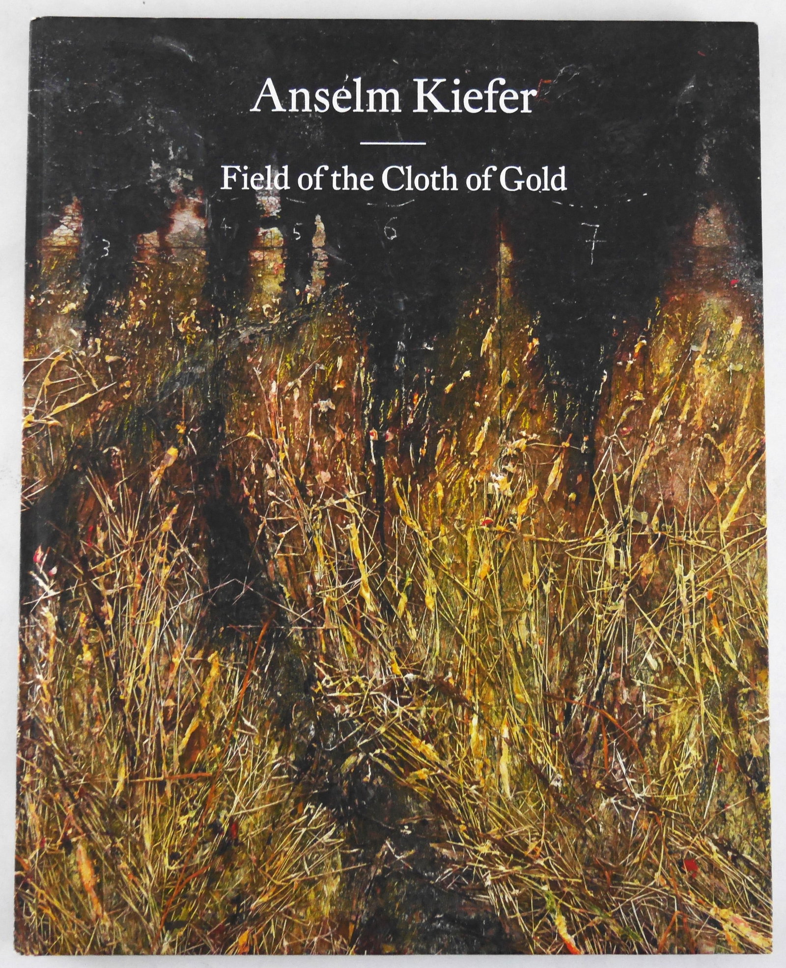 Kiefer, Anselm; Calvocoressi, Richard; Anselm Kiefer: Field of the Cloth of Gold [2021 1ST EDITION -: Gagosian, 2021. Hardcover in pictorial boards. First Edition, First Printing. 9 7/8 × 12 3/8 inches. 100 pages with numerous illustrations and photograpic images throughout. Published on the occa
