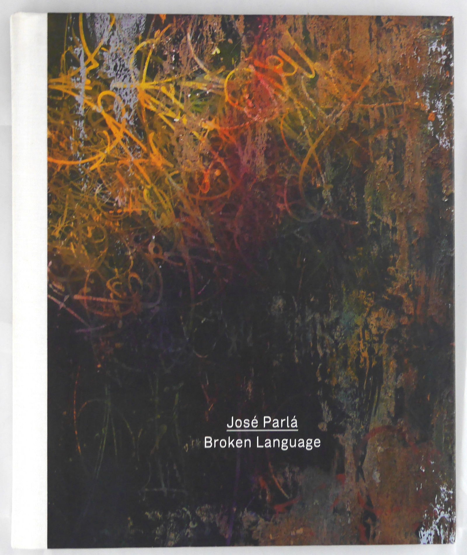 Parla, Jose; Broken Language {SIGNED - 2012 1ST EDITION - FINE]: 2012, Haunch of Venison. Hardcover in pictorial boards. 86 pages with 48 color images throughout (many double page, including one three-page gatefold). Includes an interview with Jose Parla (text in e