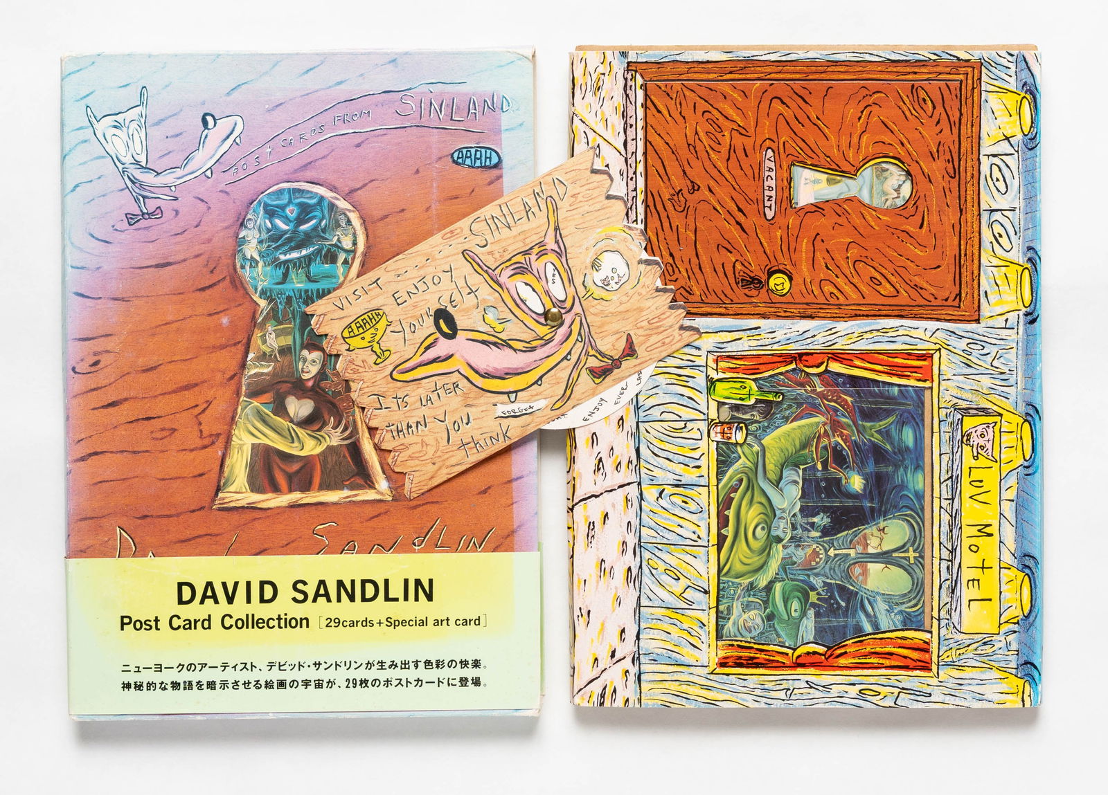 David Sandlin, Postcards from Sinland, the "Luv Motel" Collection [RARE 1991 SET IN DOUBLE SLIPCASE: Japan, Gulliver Co. LTD, 1991. First Edition. Plain cardboard block containing 2 insets for 29 cards and 1 special double-sided, spinning-wheel art card, all housed inside an inner pictorial die-cut s