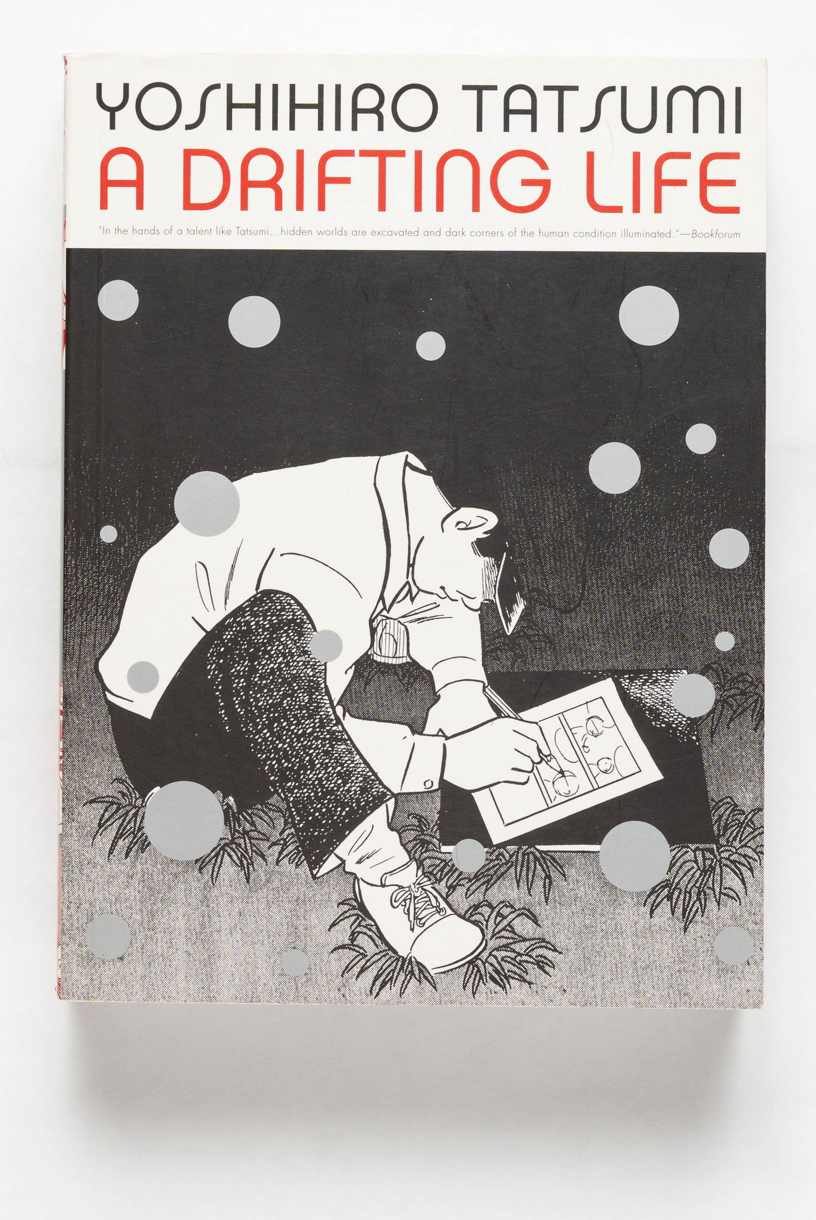 Yoshihiro Tatsumi, A Drifting Life [SIGNED WITH DRAWING - 2009 1ST EDITION - FINE]: SIGNED COPY - New York: Drawn & Quarterly, 2009. Softcover in pictorial wrappers. First edition (stated), First Printing (with the full numberline ending in 1). An epic memoir from a manga master, Tat