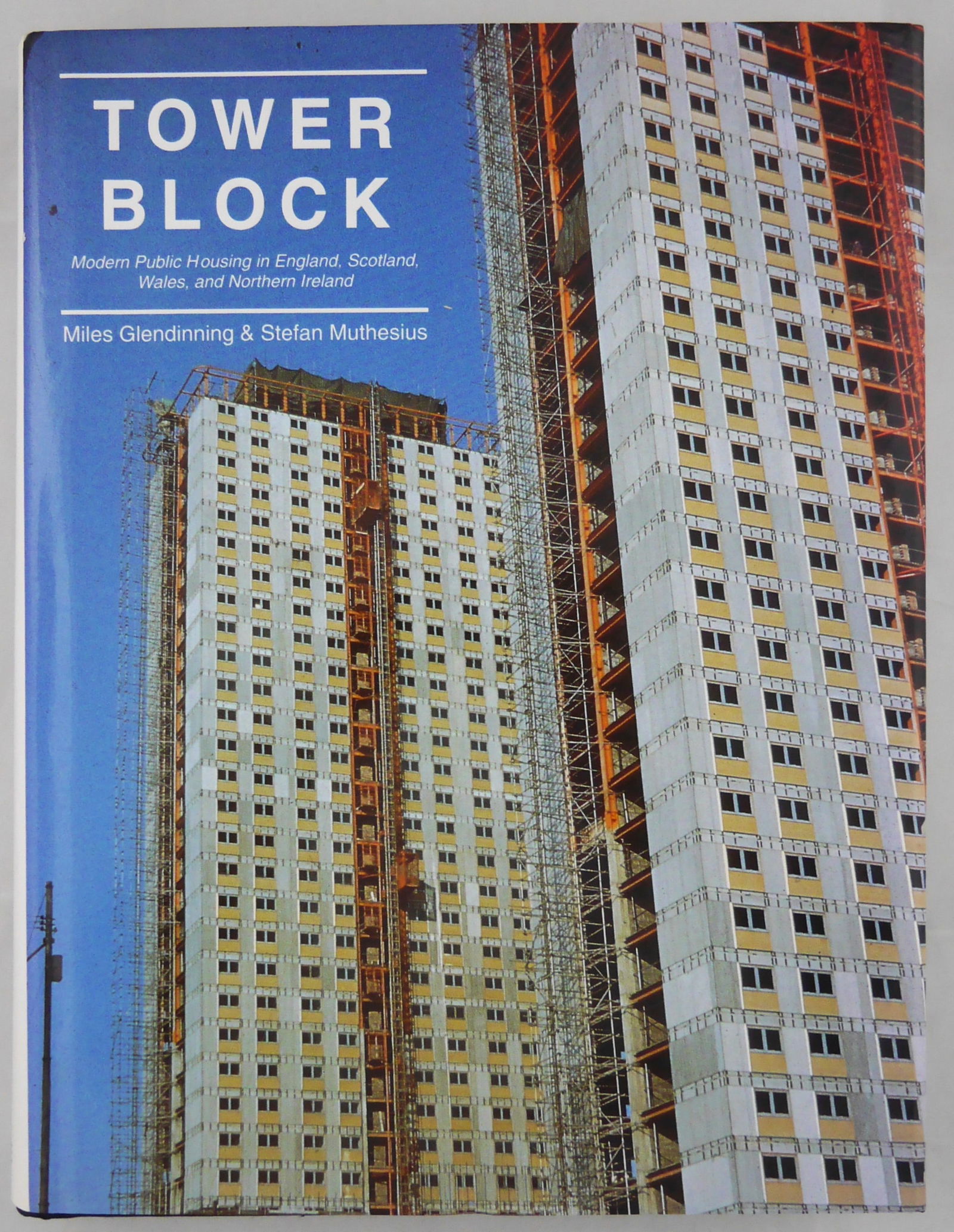 Glendinning, Miles; Tower Block: Modern Public Housing in England, Scotland, Wales and Northern: Yale University Press, 1994. Hard cover in pictorial Dust Jacket. First Edition, First Printing. 12 x 9 inches. 420 pages filled with black and white photographic images, maps, plans, and designs offe
