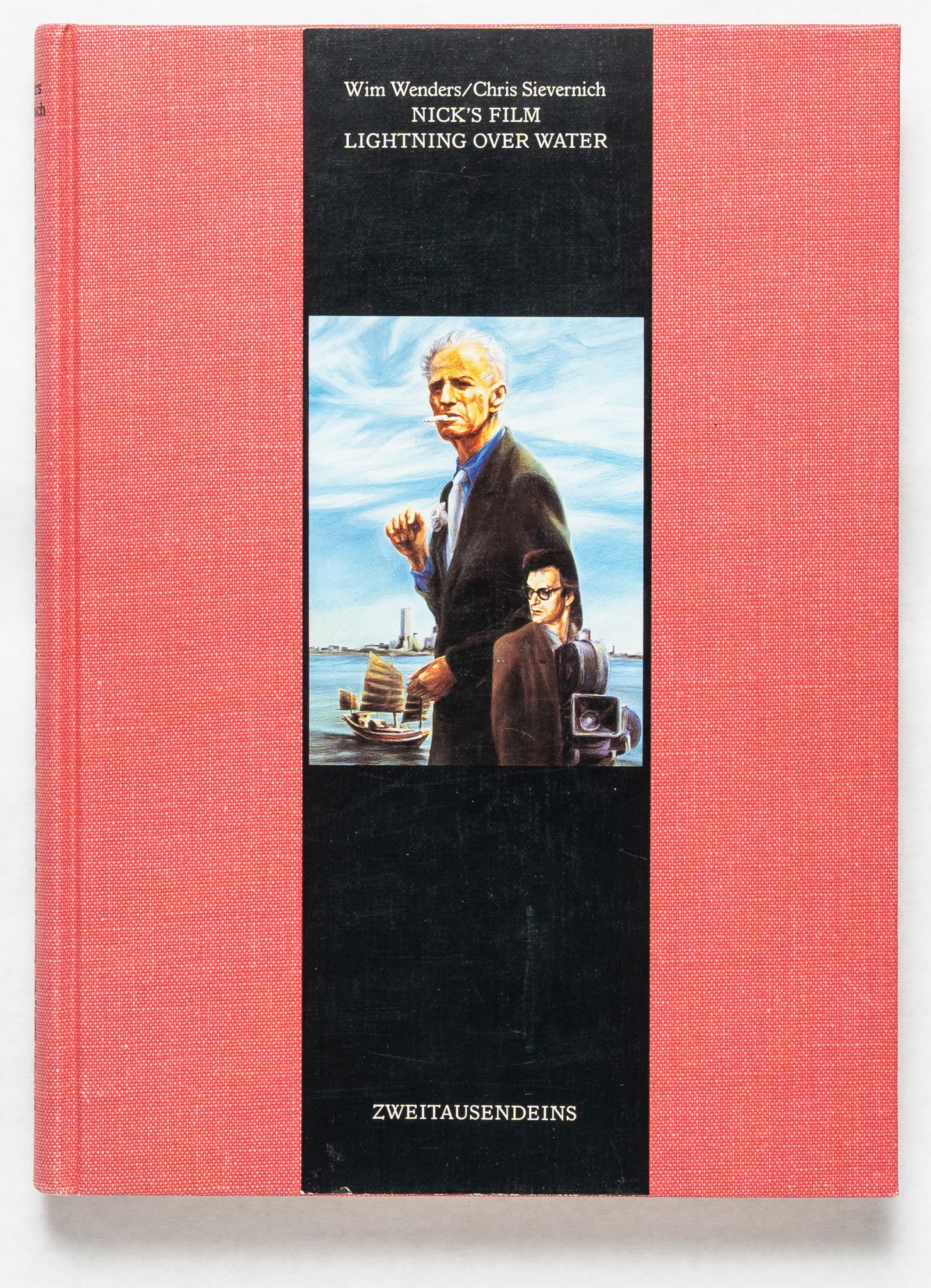 Wenders, Wim; Nick's Film / Lightning Over Water [SIGNED 1981 1ST EDITION HARDCOVER -- FINE]: Zweitausendeins, Frankfurt am Main, 1981. Hardcover in red buckram with tipped-on image to front board. First Edition, First Printing. Text in English and German. 347 pages offering a superb documenta