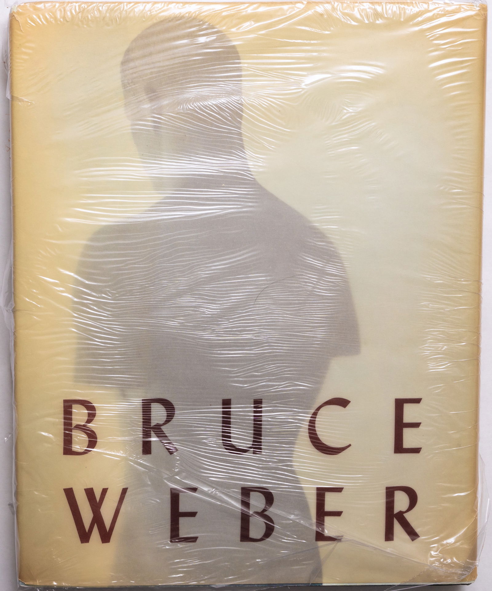 Bruce Weber - 1989 Alfred A. Knopf Monograph [FINE COPY - WITH BOTH DUST JACKETS]: New York, Alfred A. Knopf 1989. Hardcover in double dust jacket. 4to, unpaginated, with 140 plates (mostly black & white) on matt paper that includes portraits of Chet Baker, Chris Isaak, and Sam Shep