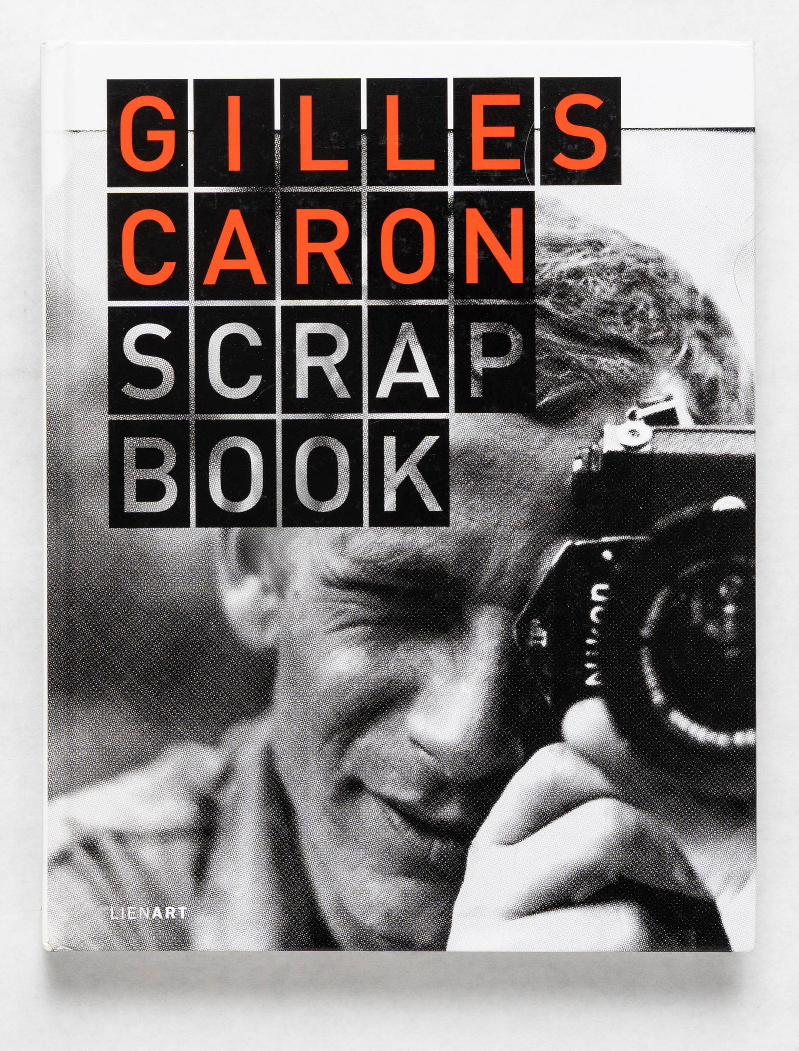 Gilles Caron Scrapbook [2012 1ST EDITION 1ST PRINTING - FINE]: Leinart, 2012. Hardcover in pictorial boards. First Edition, First Printing. 12x 9 inches. Text in English and French. 295 pages with numerous photographic images throughout in color and black and whi