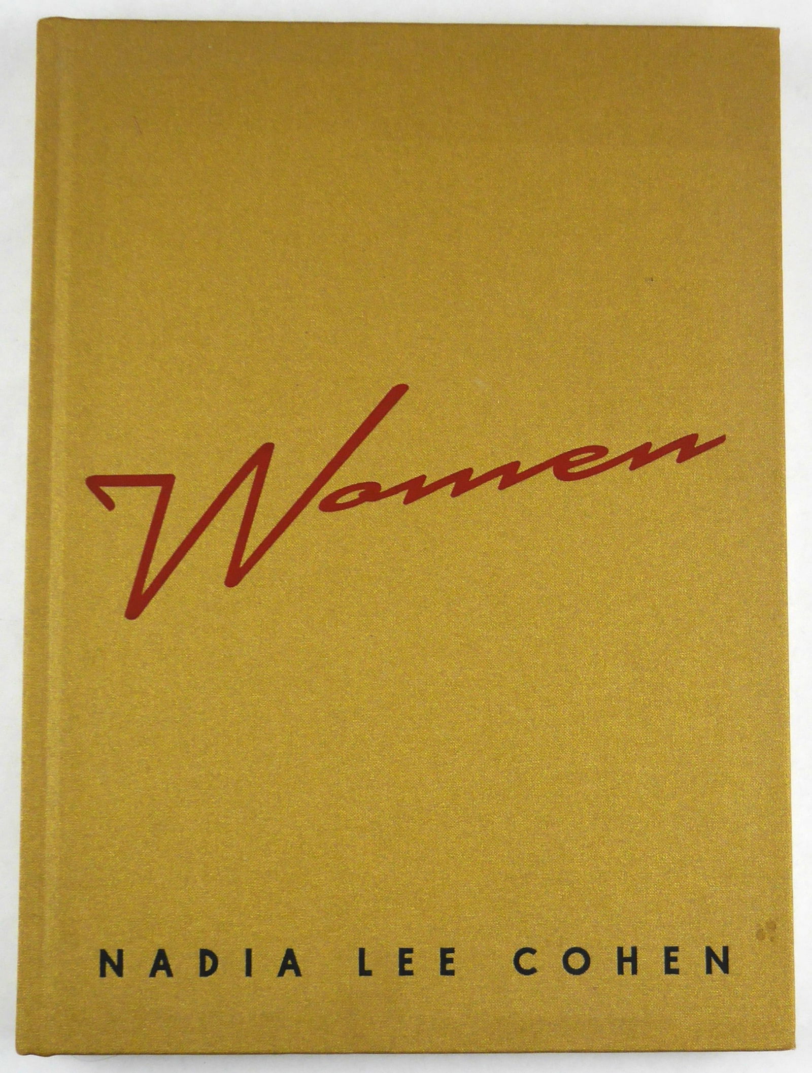 Cohen, Nadia Lee; Women [2021 2ND EDITION]: IDEA Books, 2021. Hardcover in gold cloth boards and debossed title to front cover and spine. Second Edition (stated). 216 pages with over 100 photographic images in color by Nadia Lee Cohen throughou
