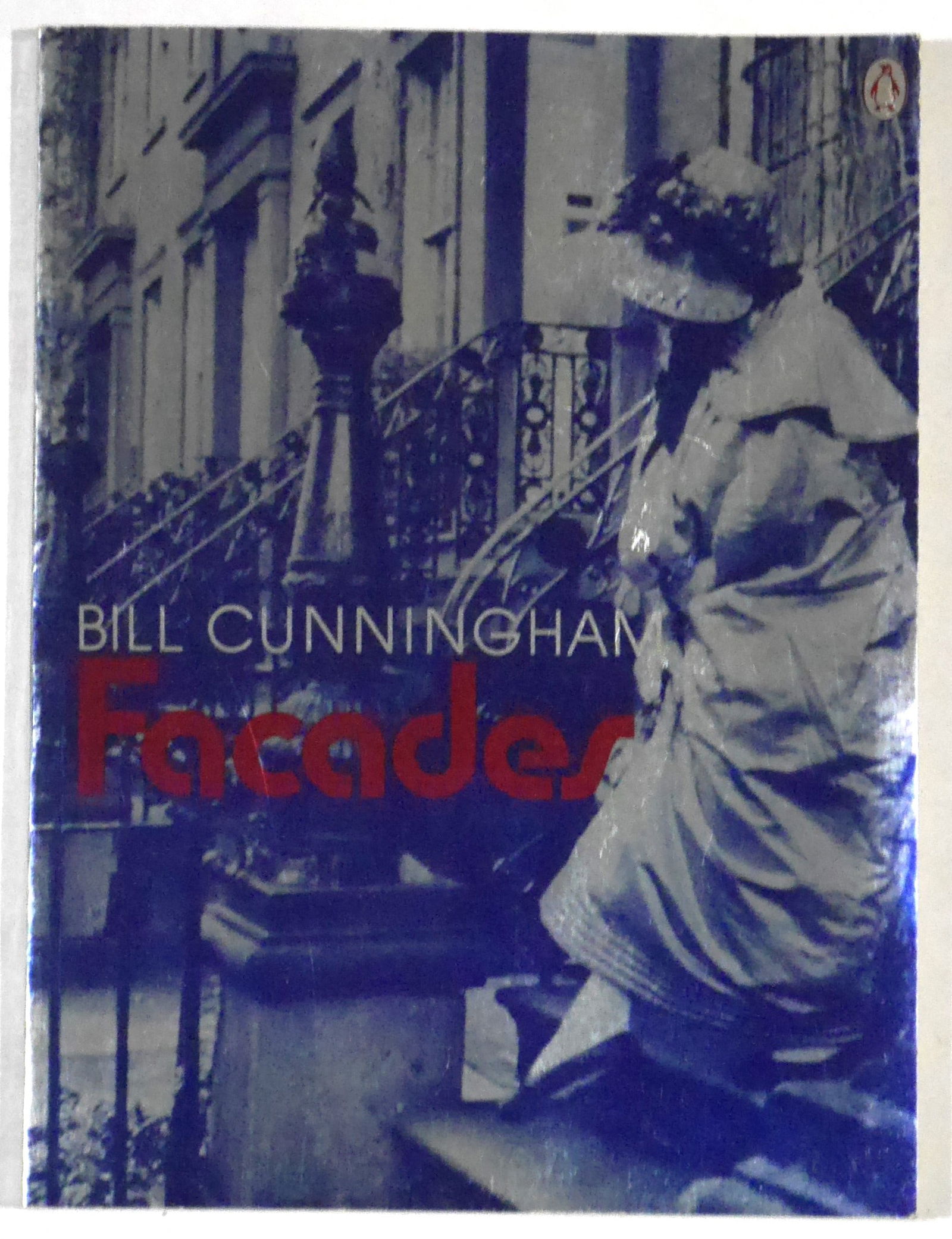 Cunningham, Bill; Sherman, Editta; Facades [SIGNED BY EDITTA SHERMAN - 1978 1ST EDITION 1ST PRINTING: Penguin, 1978. Softcover in pictorial wrappers SIGNED by Editta Sherman. First Edition, First Printing. 128 pages filled with numerous photographic images throughout featuring Cunningham's photos of E