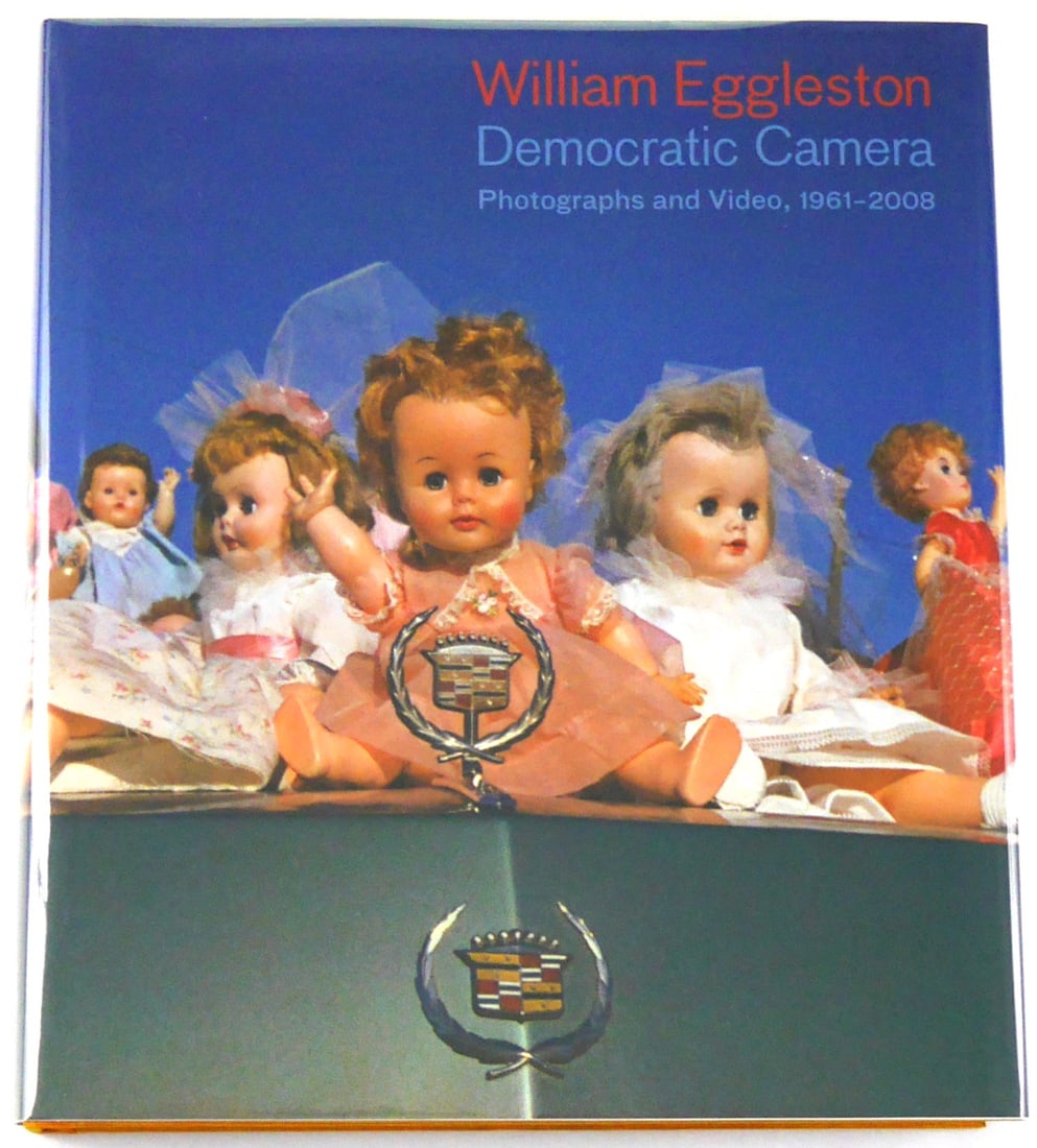 Eggleston, William; Democratic Camera, Photographs and Video, 1961-2008 [SIGNED - FINE COPY]: The Whitney Museum of American Art. Whitney Museum/Yale University Press, 2008. Hardcover in pictorial dust jacket. First Edition, Second Printing. 176 pages with 134 color and black and white photogr