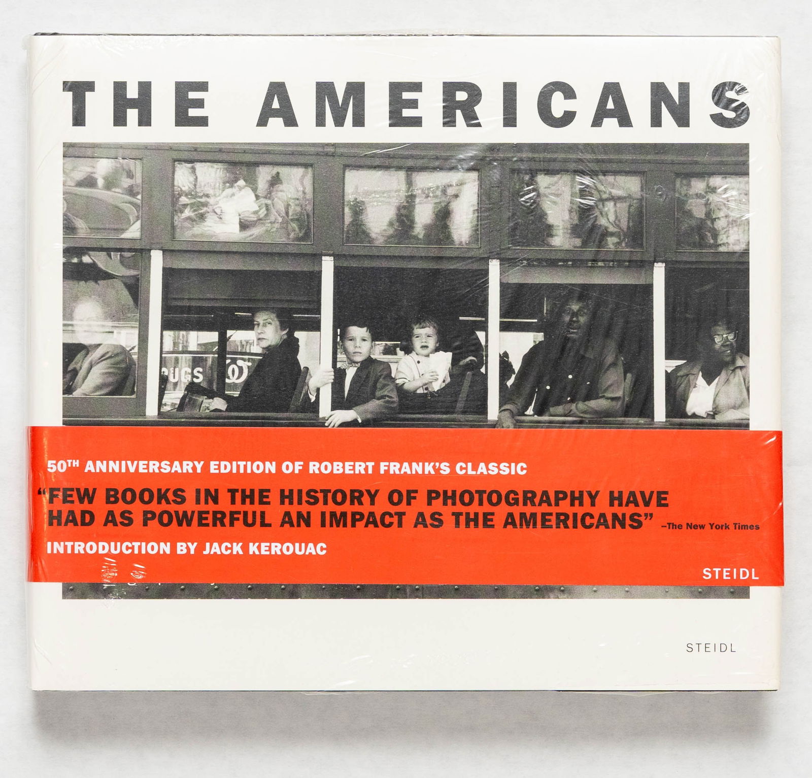 Frank, Robert; Americans [2008 Steidl 1ST EDITION WITH RED BAND]: Gottingen, Germany: Gerhard Steidl Druckerei Und Verlag, 2008. Hardcover in pictorial dust jacket and red wrap-around band. First Edition, First Printing. 180 pages with numerous black and white photo