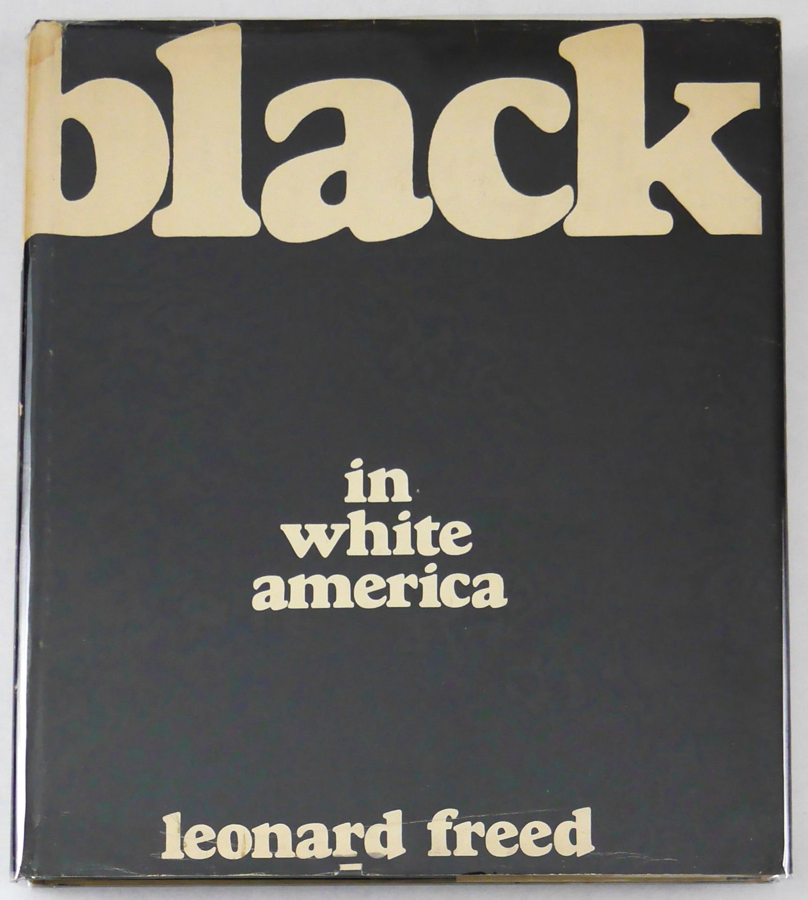 Leonard Freed, Black in White America [1967 1ST EDITION HARDCOVER]: Grossman Publishers, 1967. Hardcover in printed dust jacket. First edition and first printing. 12 x 10 inches. 208 pages offering a powerful photographic meditation on life for African-Americans in th