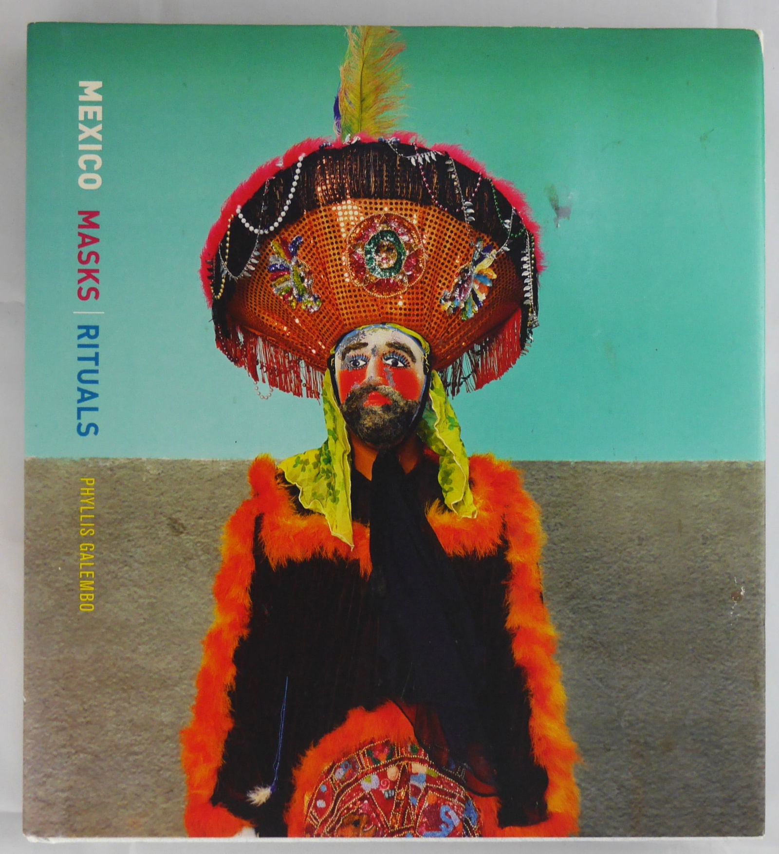Galembo, Phyllis; Mexico Masks Rituals [SIGNED - 2019 1ST EDITION & 1ST PRINTING - FINE COPY]: Radius Books, 2019. Hardcover in pictorial dust jacket. First Edition, First Printing. 196 pages with 120 photographic images throughout. SIGNED by Phyllis Galembo. BOOK CONDITION: Fine;a solid, tight