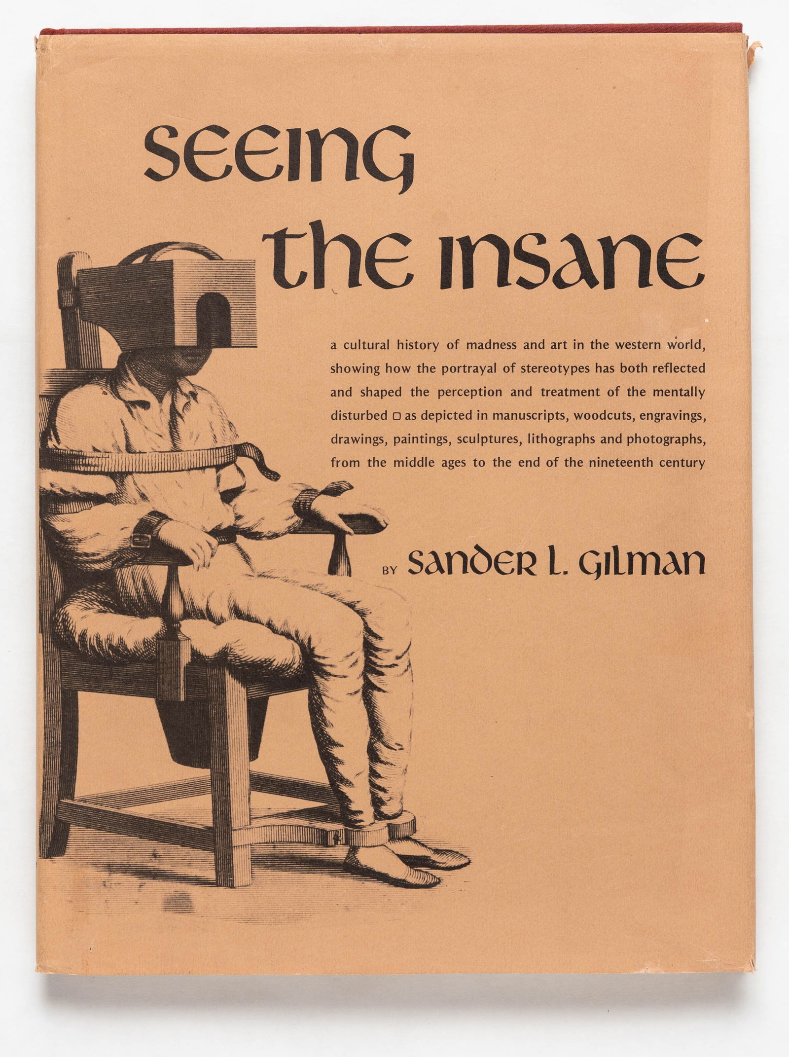 Gilman, Sander L.; Seeing the Insane [1982 1ST EDITION WITH JACKET - FINE]: John Wiley & Sons (in association with Brunner/Mazel Publishers, New York), 1982. First Edition, First Printing (with the full numberline ending in 1). 12.25 X 9.25 inches.239 pages with 287 black and