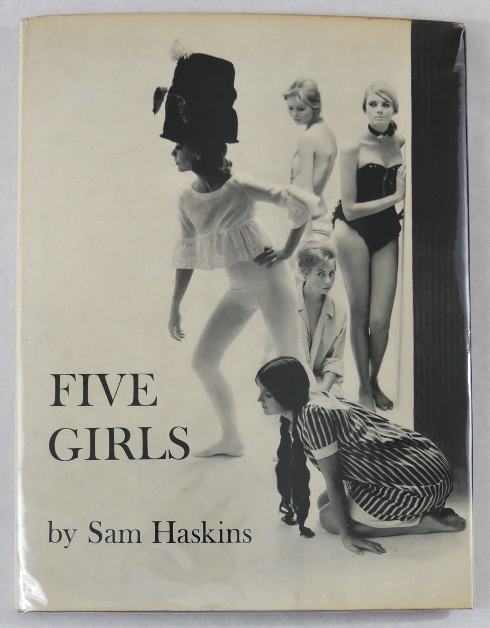 Haskins, Sam; Five Girls [1965 1ST EDITION HARDCOVER WITH DUST JACKET]: The Bodley Head 1965. Hardcover in grey boards with title lettered in red to the backstrip and upper front board; in pictorial dust jacket. First edition, First Printing. Haskin's first book. 143 page