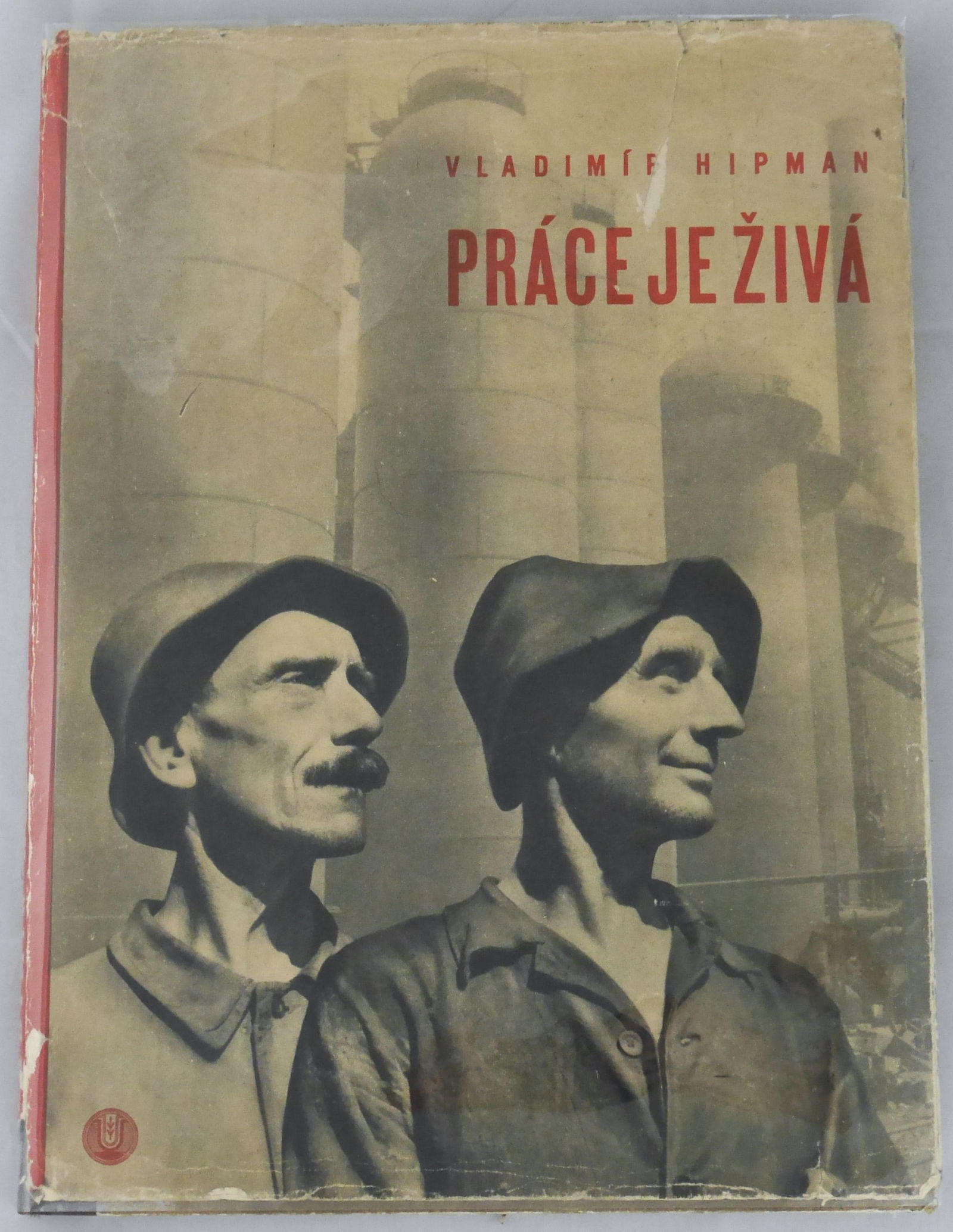 Hipman, Vladimir; Prace Je Ziva (Work is Living) [1945 1ST EDITION WITH DUST JACKET - NICE COPY]: Praha: Ceska graficka unie 1945. Hardcover in pictorail dust jacket. Photographs by Vladimir Hipman offering a tribute to the workers of newly liberated Czechoslovakia. Profusely illustrated with 172