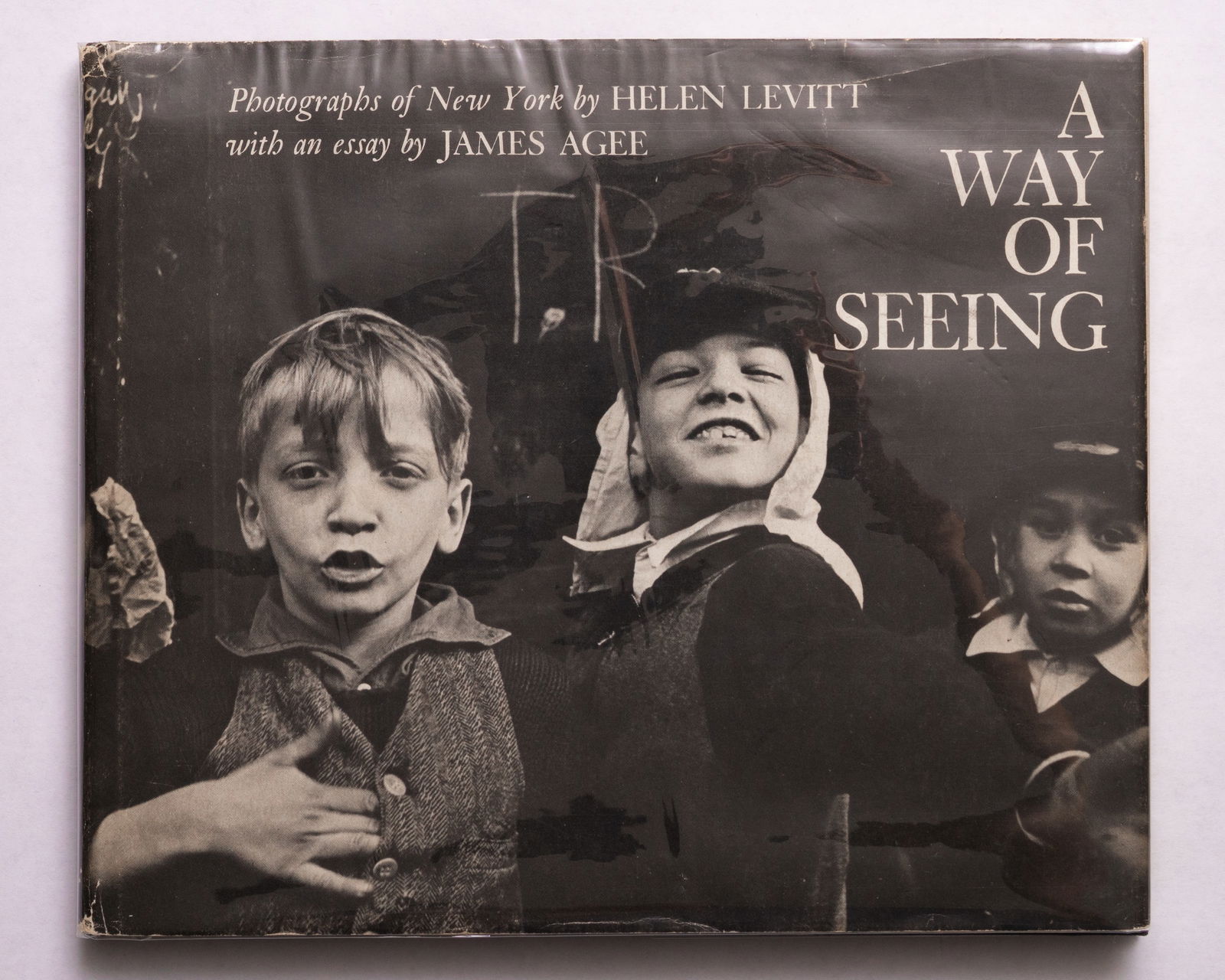 Levitt, Helen; Agee, James; A Way of Seeing [1965 1ST EDITION HARDCOVER WITH DUST JACKET]: New York: Viking Press, 1965. Hardcover in pictorial dust jacket. First Edition, First Printing. Oblong 8vo, 78 pages with numerous balck and white photographic images throughout. Cited ubuquitously,