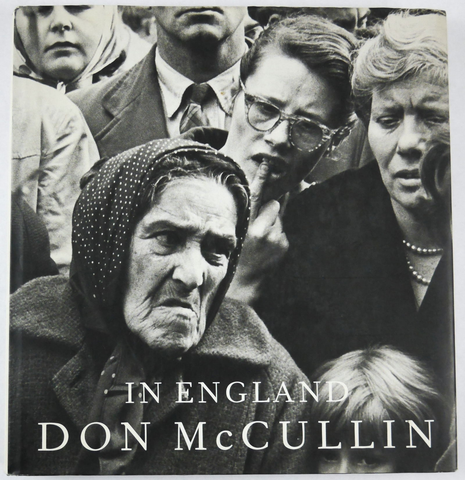 Don McCullin, In England [SIGNED - 2007 1ST EDITION 1ST PRINTING - FINE]: London: Jonathan Cape, 2007. Hardcover in pictorial dust jacket. First Edition, First Printing (with full numberline ending in 1). 12 x 12 inches. 252 pages filled with black and white photographic im