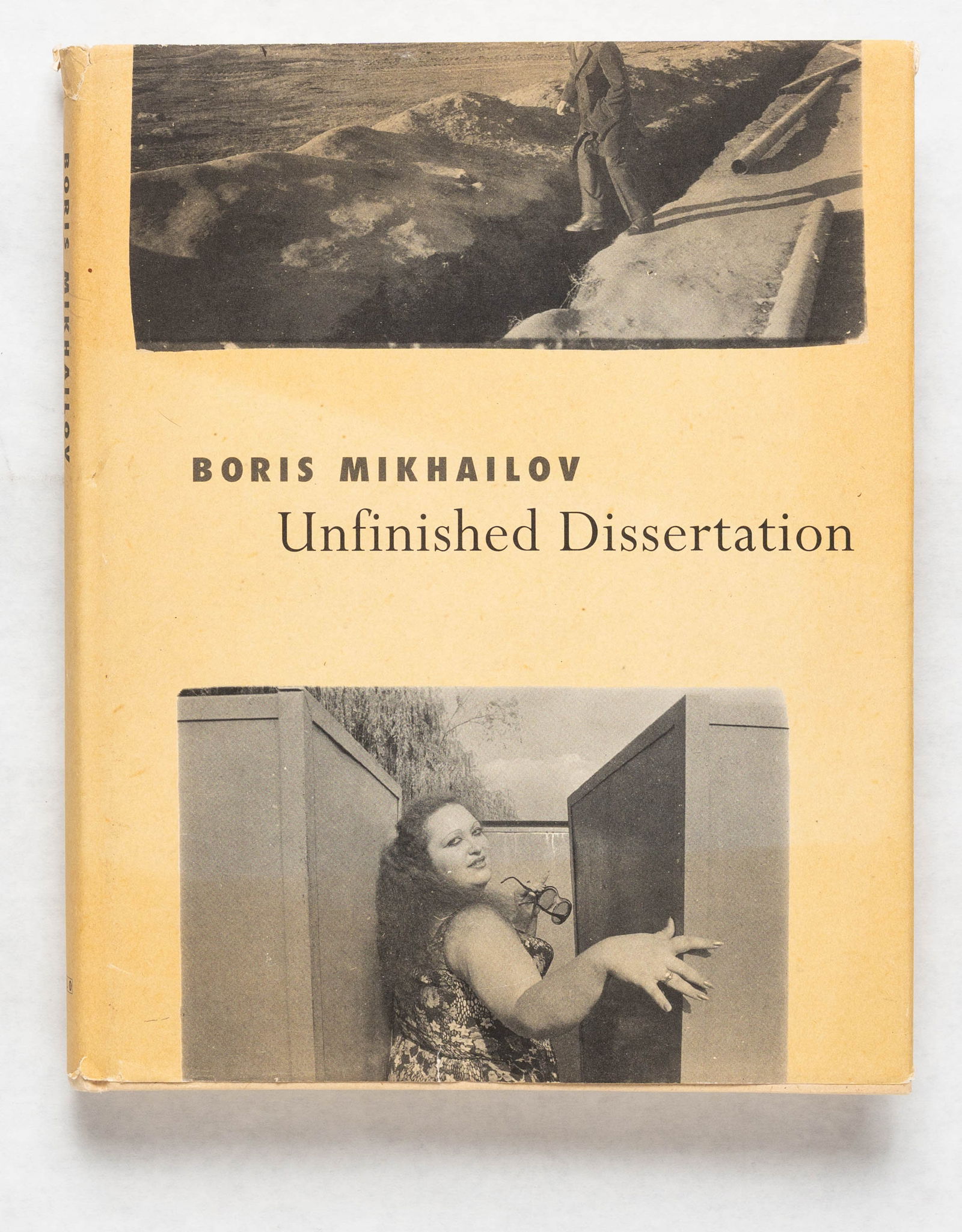 Boris Mikhailov, Unfinished Dissertation [SIGNED 1ST EDITION 1ST PRINTING]: Scalo, Zurich, Berlin, New York. 1998. Hardcover in pictorial dust jacket. First english edition, first printing. Cited in The Open Book, Hasselblad Center, Stockholm, page 376/377. 802 photobooks fro