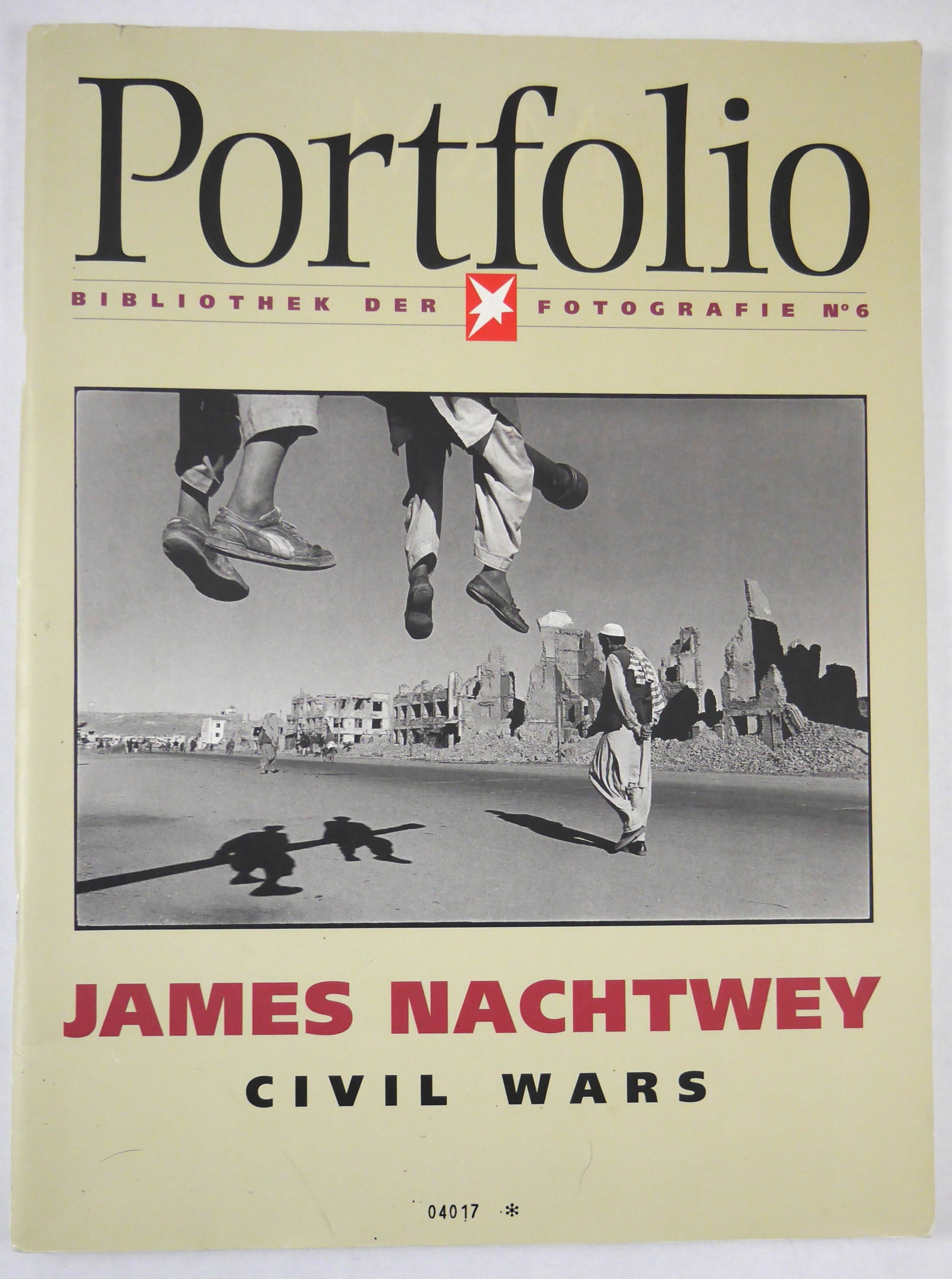 James Nachtwey: Civil Wars, Bibliothek Der Fotografie No. 6 [SIGNED 1998 1ST EDITION]: SIGNED COPY - Stern / te Neues, 1998. Paperback in pictorial covers. First edition, first printing. 14.25 x 10.5 inches. 96 pages with numerous full-page b&w photographic images throughout by Jammes N